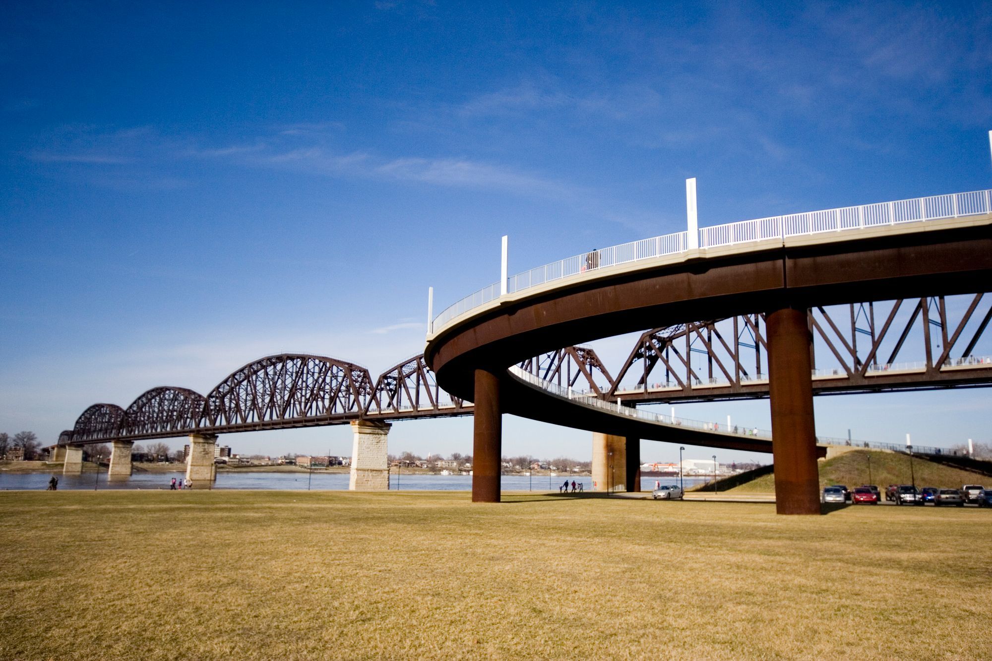 The Big Four Bridge crossing the Ohio River at Louisville, seen from the waterfront lawn.