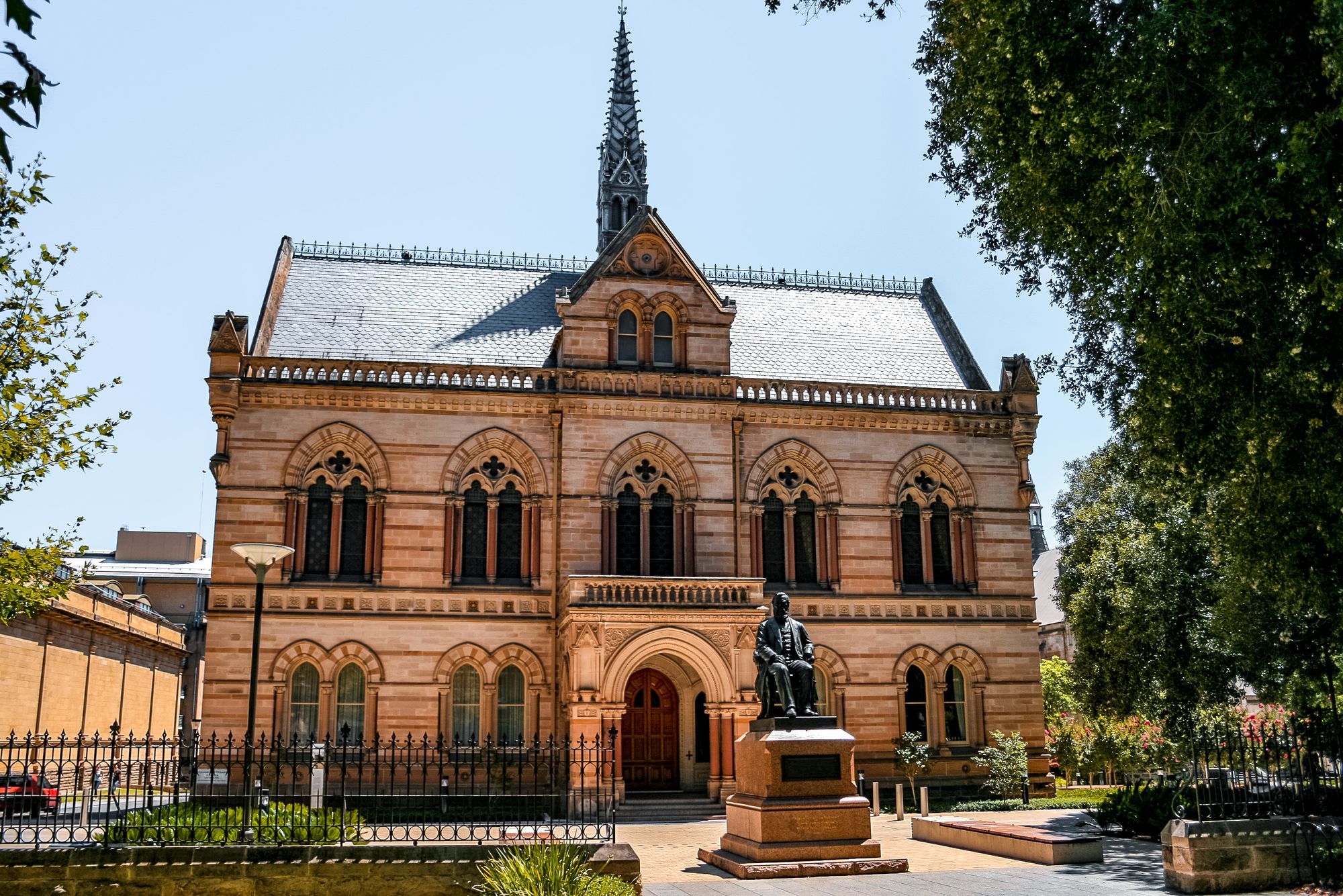 The Mitchell Building, an ornate Victorian Gothic building in Adelaide, under a clear blue sky.