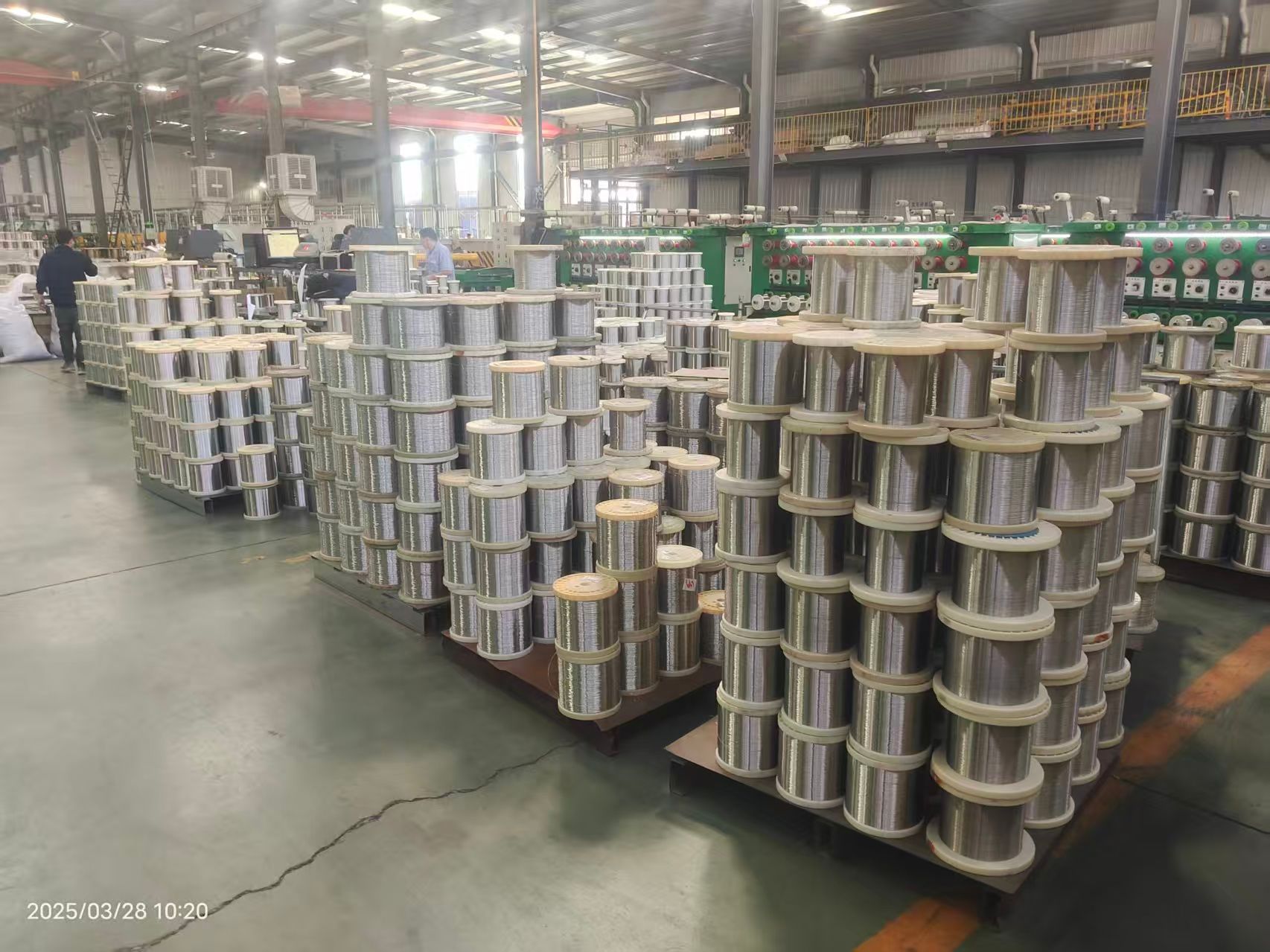 KAIFIL factory workshop staging stainless wire spools beside machines