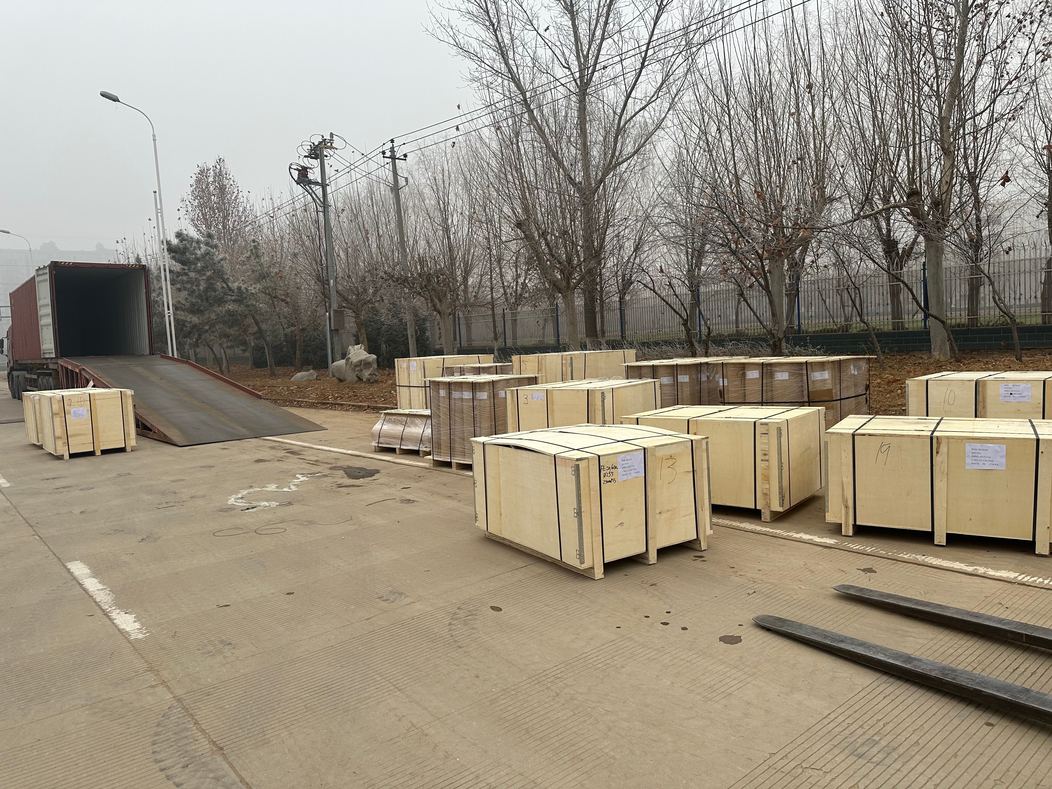 Export wooden crates loaded into a shipping container for international delivery