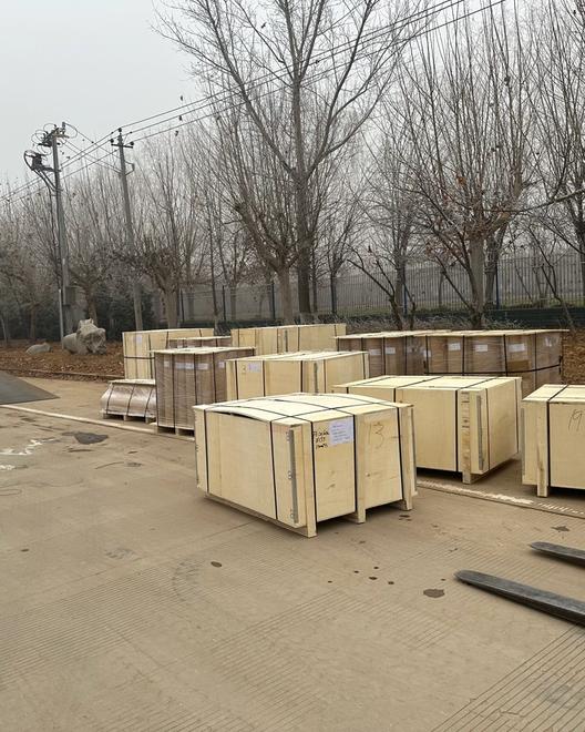 Export wooden crates loaded into a shipping container for international delivery