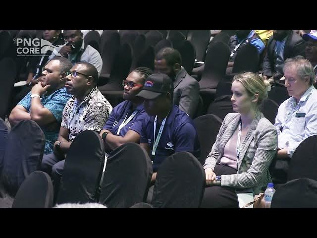 Musje Werror presenting at the PNG Resources Week