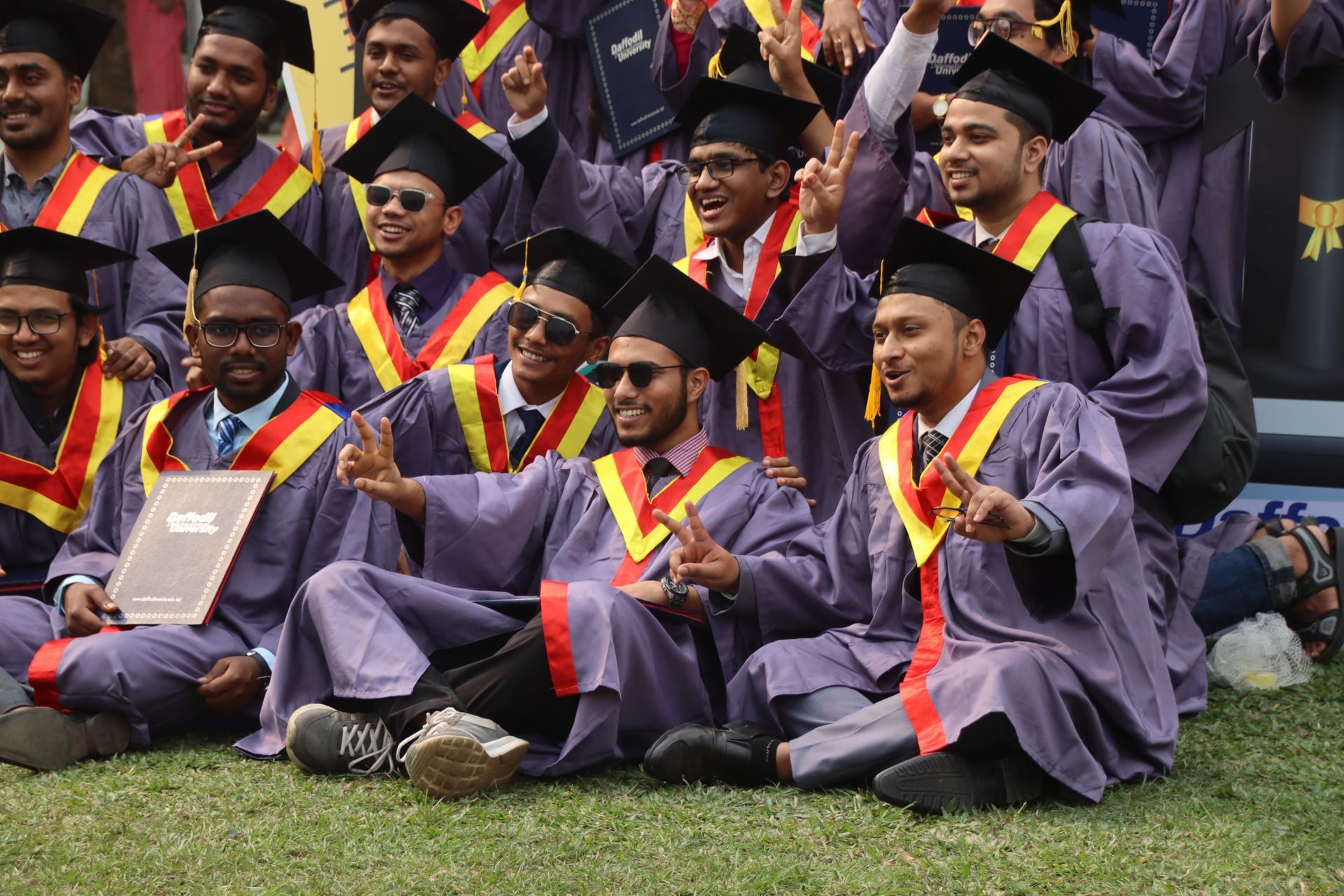 Indian graduates in caps and gowns at a convocation