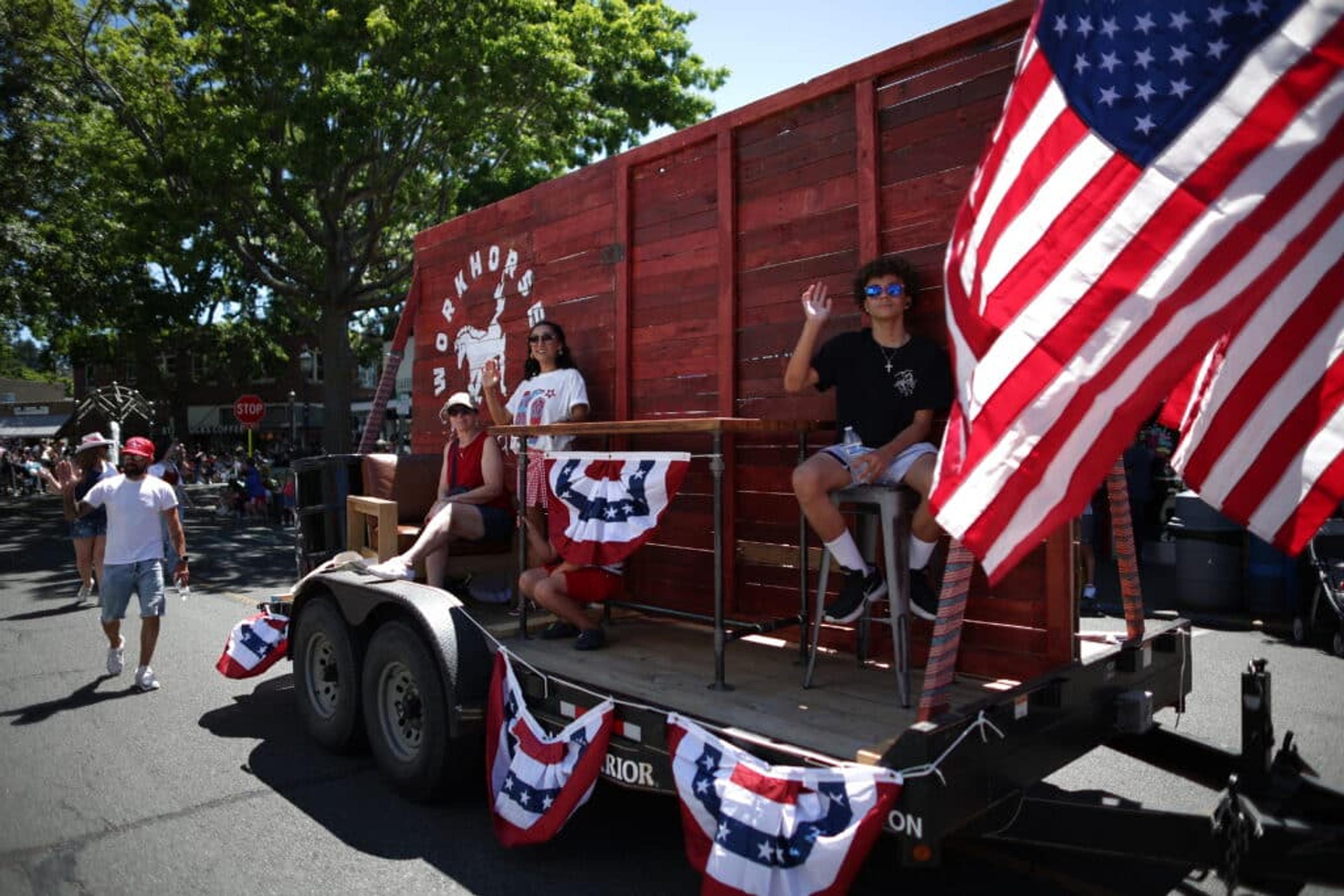 Kids Sitting on the workhorse float in the Edmonds Parade.