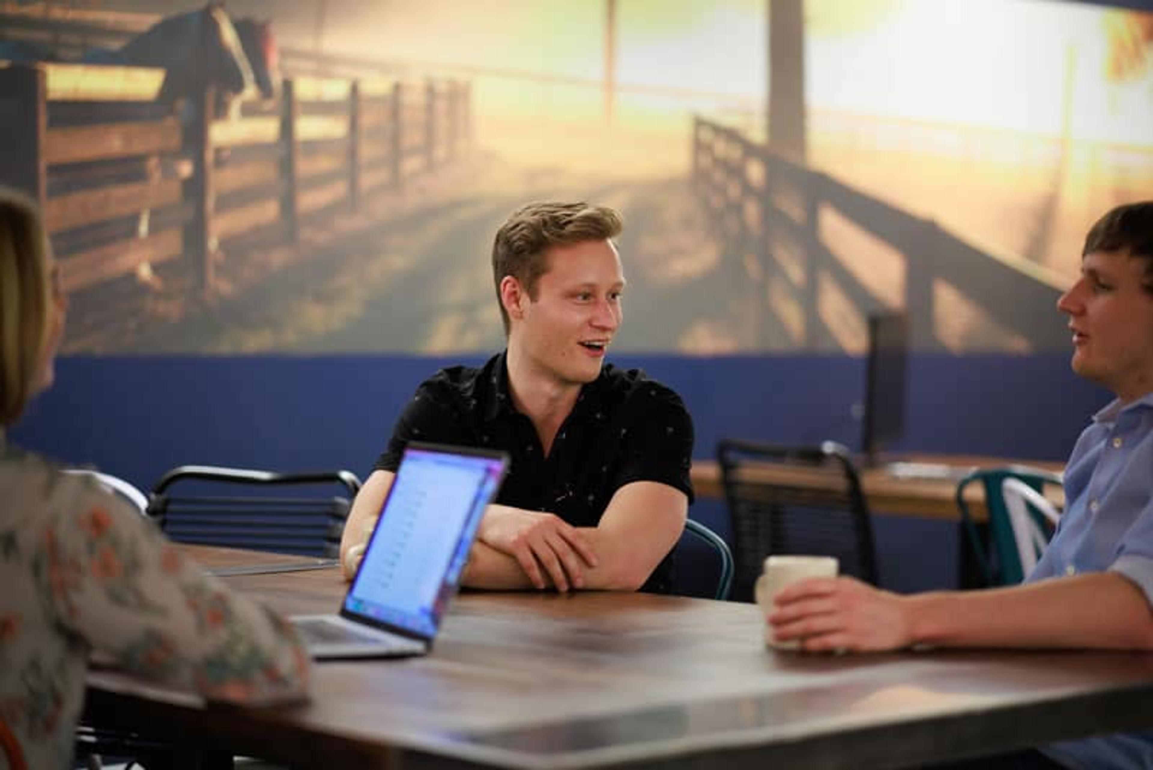Hot desk member at a table