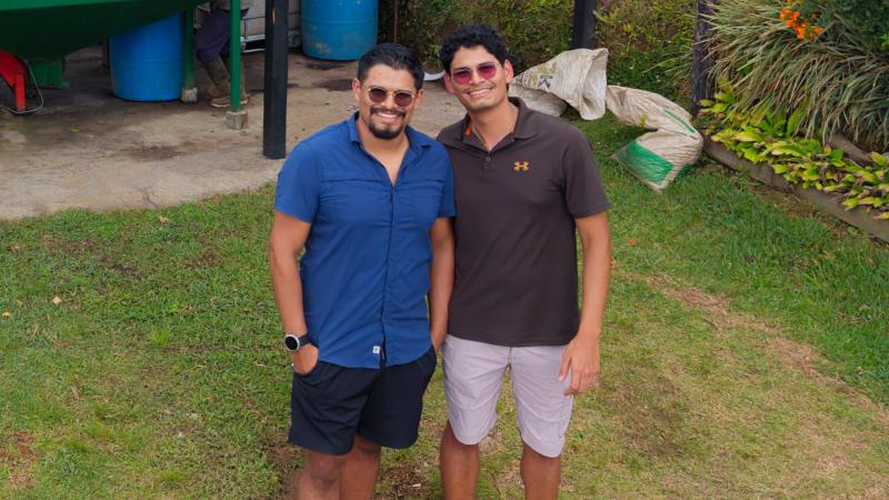 Andrés and Diego, founders of Dos Tazas, smiling at the camera in a relaxed setting.