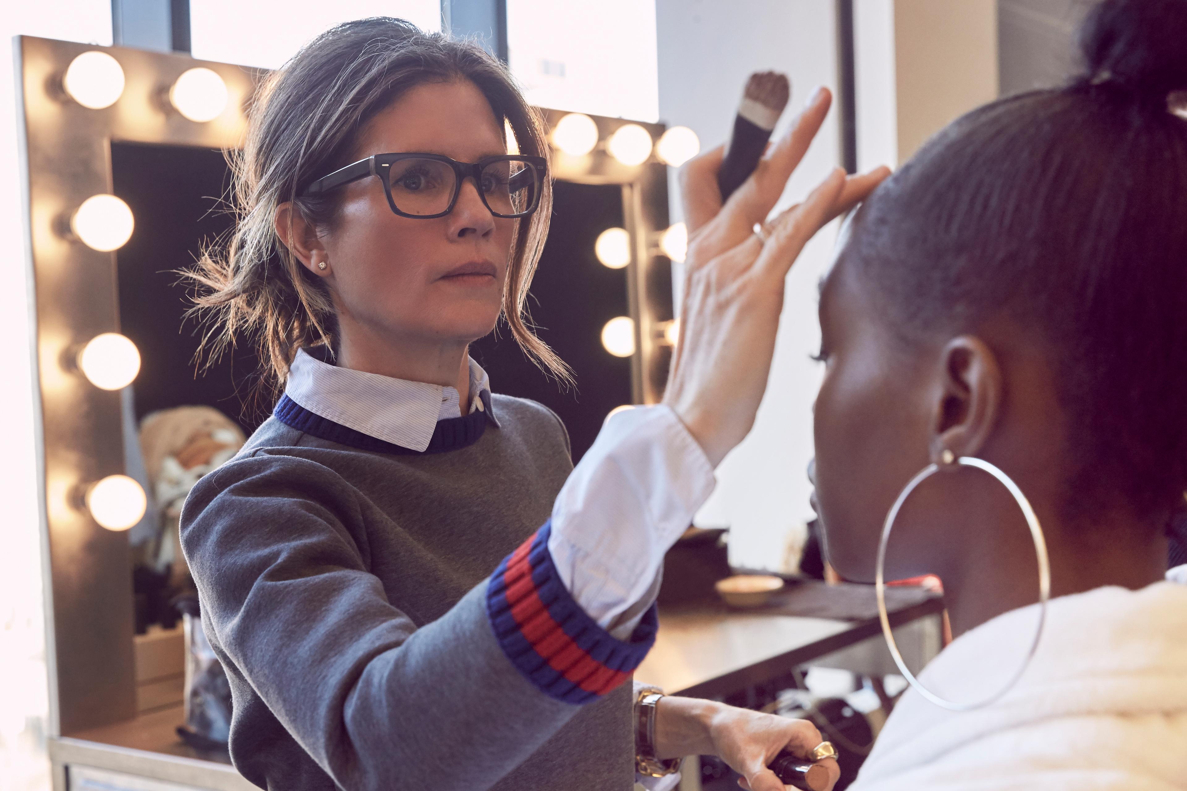 GUCCI WESTMAN APPLYING MAKEUP TO MODEL