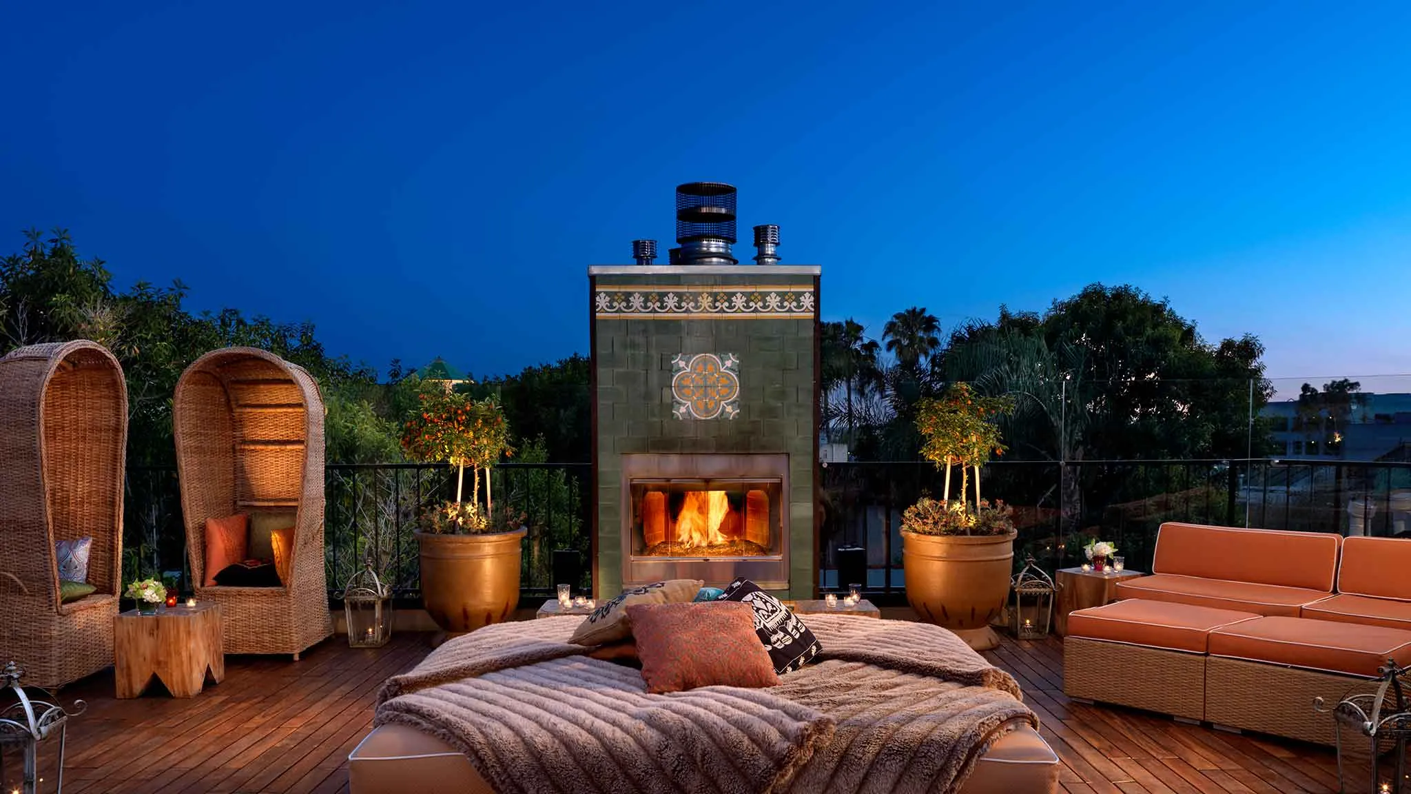 Fireplace and daybeds on the Petit Ermitage terrace