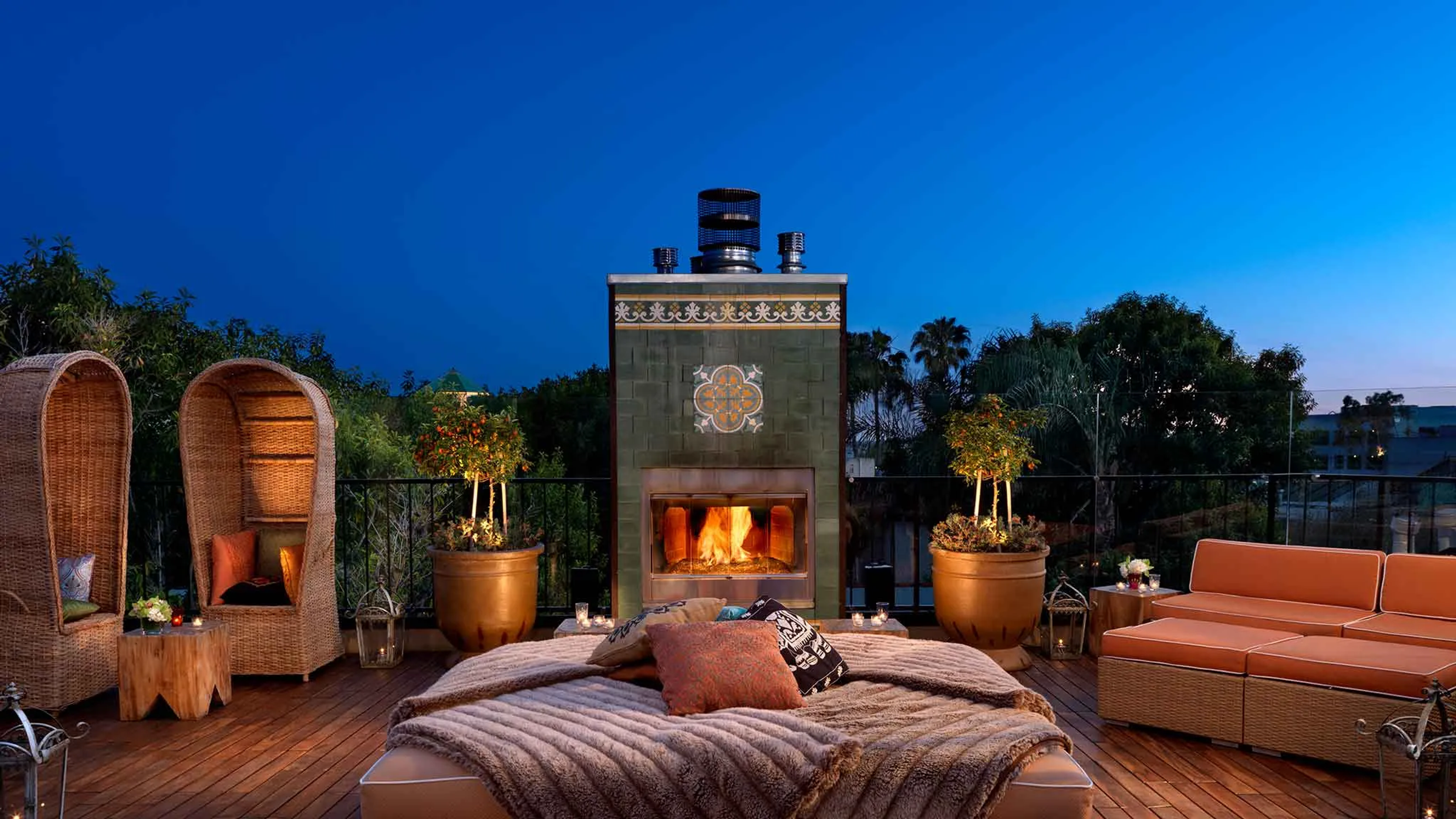 Fireplace and daybeds on the Petit Ermitage terrace