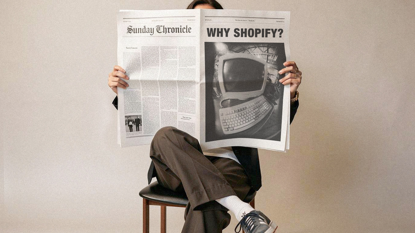 Newspaper headline reading "Why Shopify?" — hero image for 1r Agency's blog on why DTC brands choose Shopify.