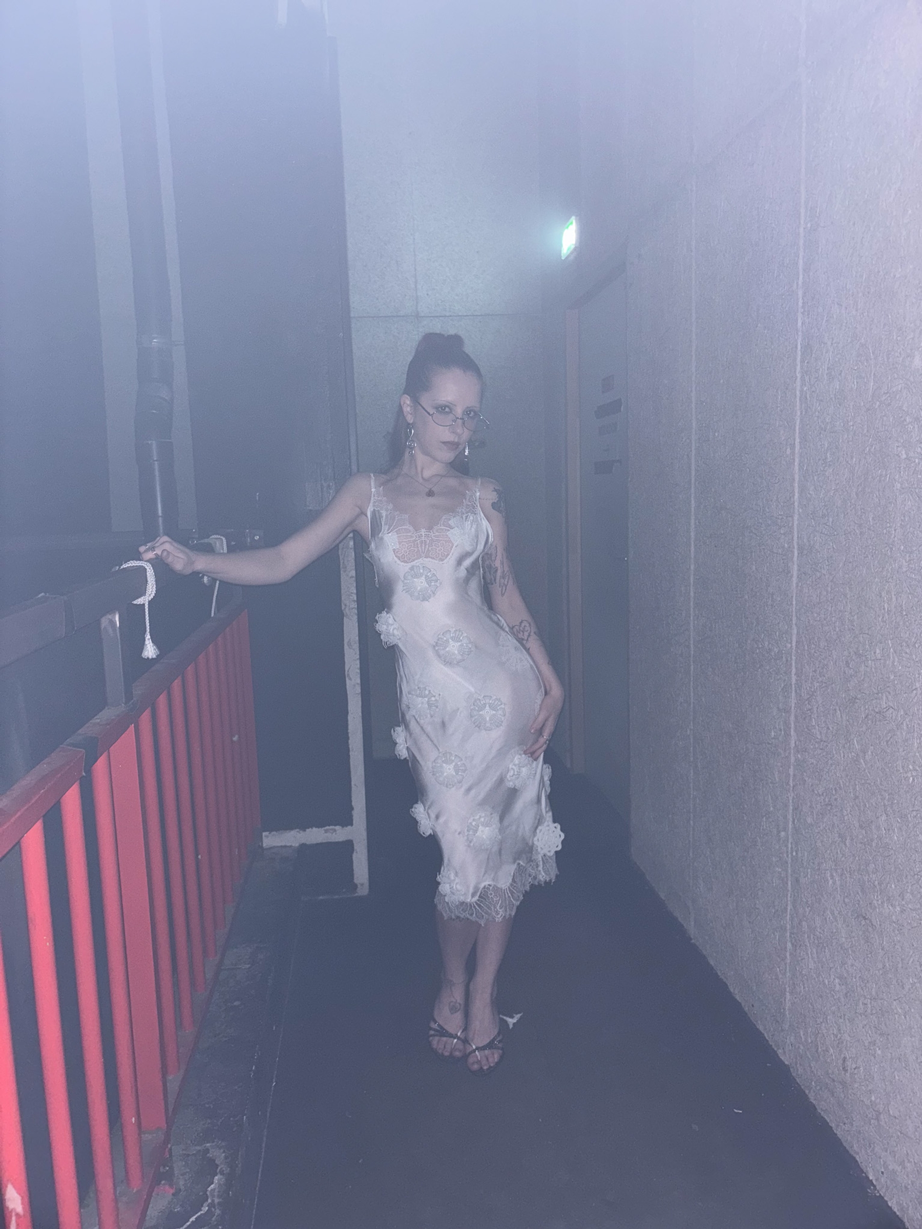 Dress & Shoes Coperni, Glasses borrowed from a friend, Earrings Vintage
