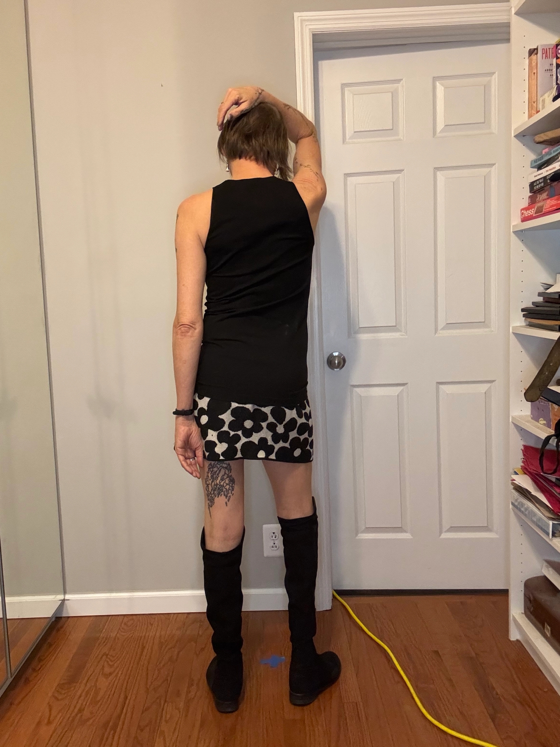 Top Wolford, Skirt H&M, Boots Stuart Weizman, Watch Swatch, Earrings Basque Design Centre