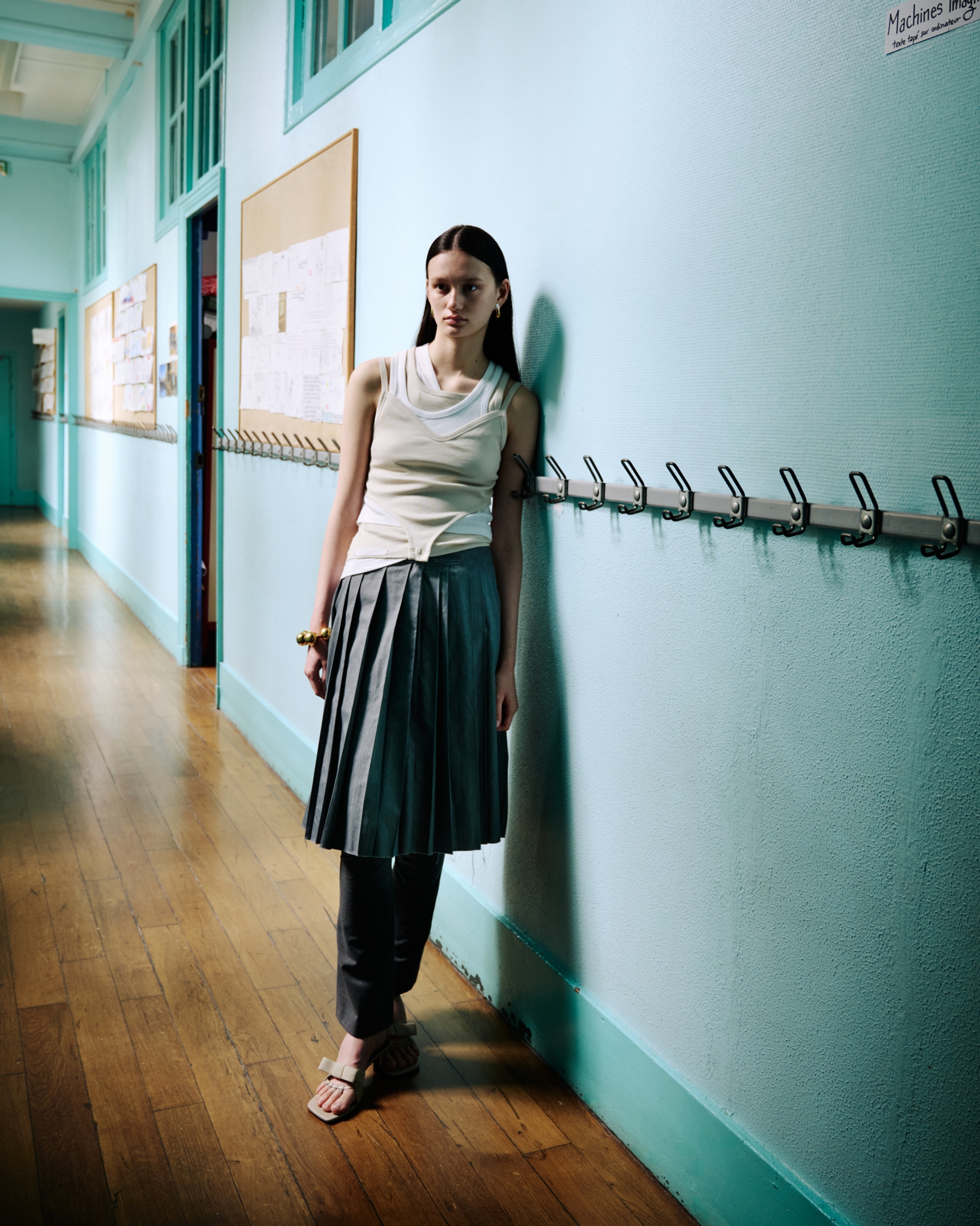 Top & Shoes ALAINPAUL, Trousers Ottolinger, Skirt Camiel Fortgens, Earrings & Bracelet D’Heygere
