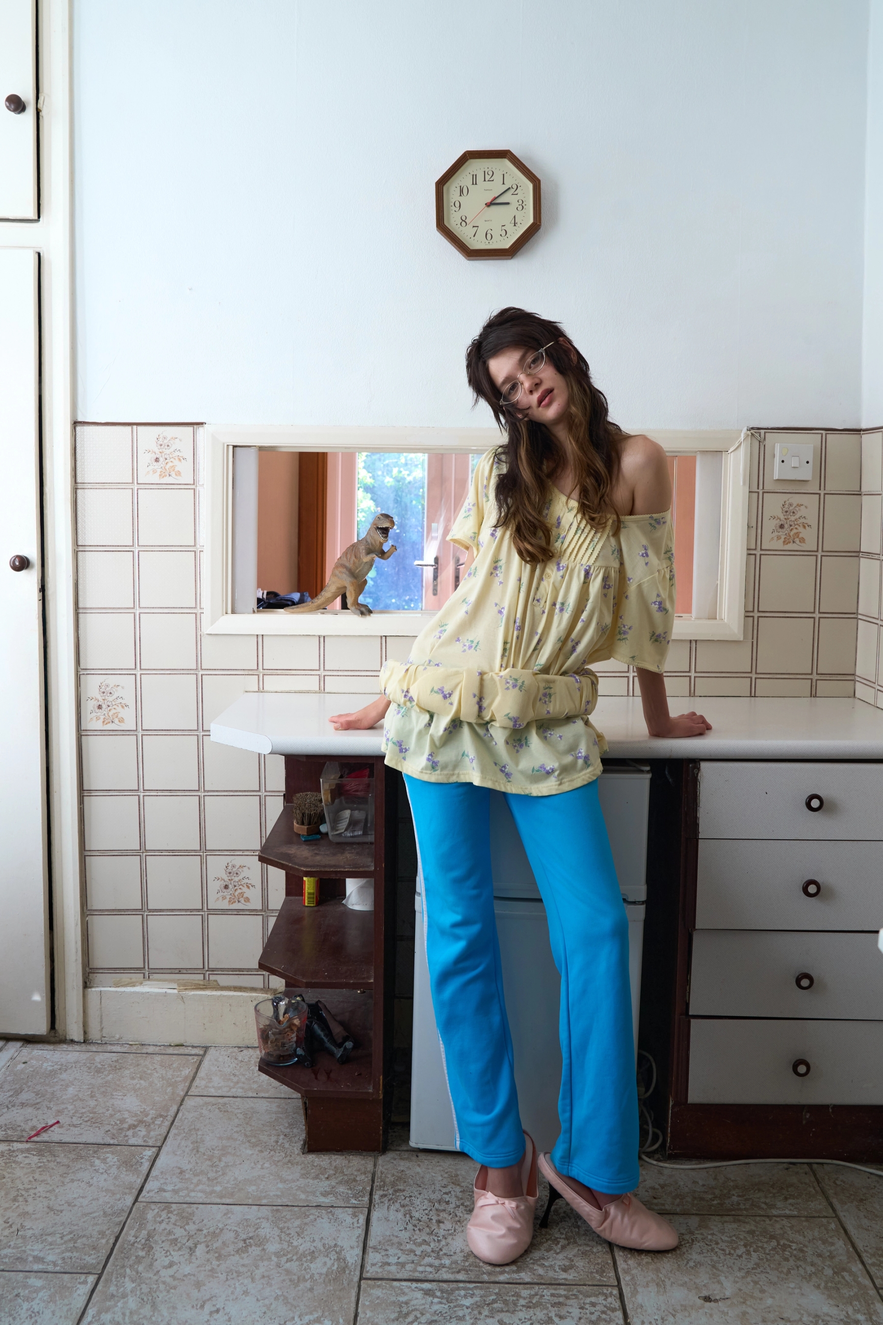 Dress: Phoebe Pendergast, Joggers: Adidas, Shoes: Balenciaga, Glasses: Stylist's own, Custom wig: Masaki Kundayo 