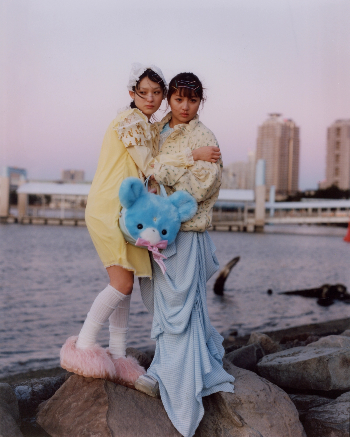 Yuri wears long sleeve shirt, head piece and rabbit bag Angelicpretty, dress JennyFax, furry shoe Mikiosakabe/ Reian wears shirt and bear furry bag Angelicpretty, sweater Yasukawa, skirt Perminute, shoes Mikiosakabe