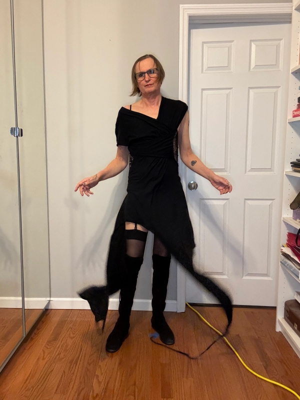 Dress Demobaza, Camisole Fredericks of Hollywood, Stockings Wolford, Boots Stuart Weizman