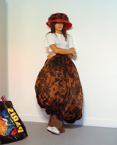 LEFT to RIGHT Pan @ Elite Model, hat and chocker Christian Lacroix Archives,
Lyne @ Supreme Management, bronze bustier with printed sleeves, embroidered wrists and blue satin lace painted skirt Christian Lacroix Archives Fall/Winter 2001,
PZ Mathilde Vallatin Dulac customization on hat Christian Lacroix Archives,
Camille @ GIRL mgmt, asymmetrical ball skirt in printed satin Christian Lacroix Archives Fall/Winter 1987, hat Christian Lacroix Archives Spring/Summer 1992