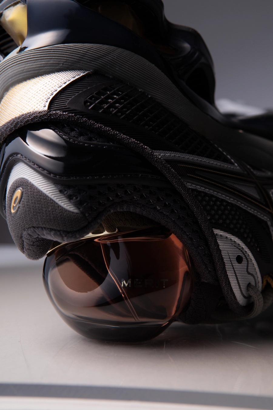 Left to right: Isamaya Beauty Lip Lacq | Merit Retrospect Parfum, Asics Gel Kayano 14 
