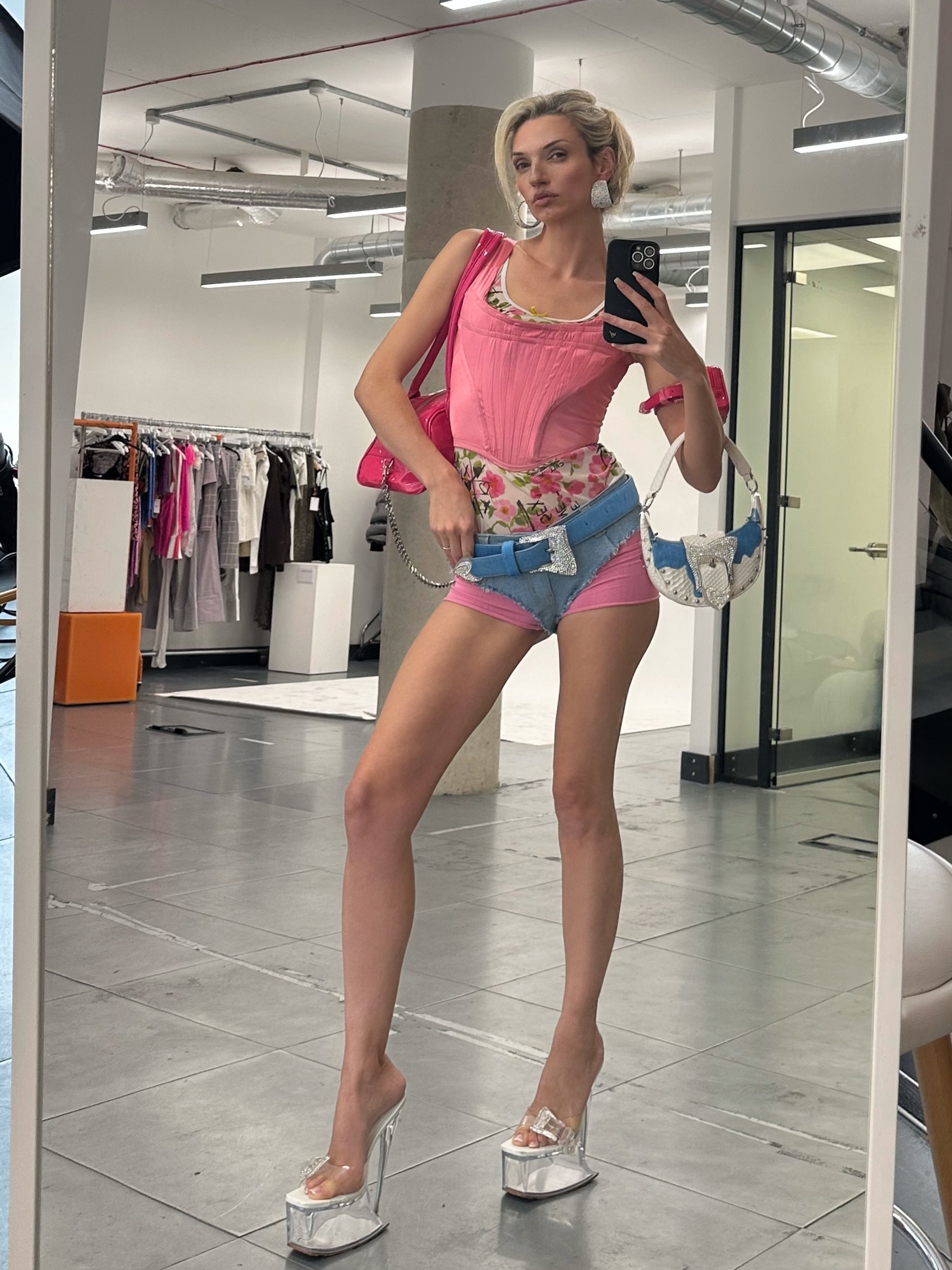 Bags Poster Girl, Vest Top D&G, Corset Vivienne Westwood, Pink Hotpants Playthings Miami, Denim Hotpants, Belt & Shoes Poster Girl