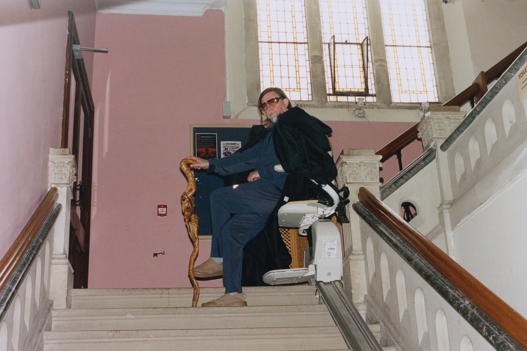 Mark: Tracksuit, sunglasses, earring and shoes talent’s own, Dress worn as cape Simone Rocha