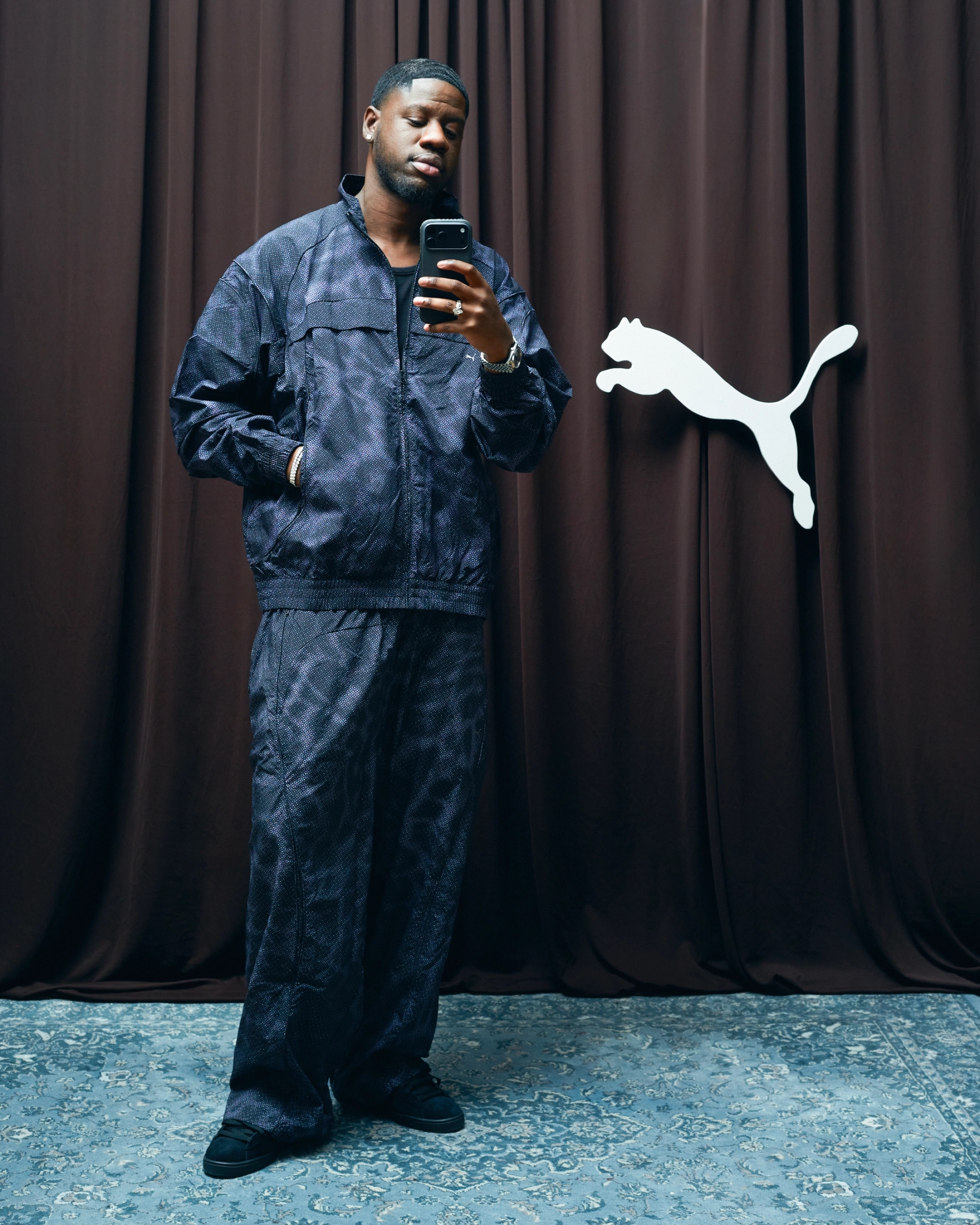 Tracksuit & Shoes Puma, Tank Top stylist’s own, Jewelry & Watch
talent’s own