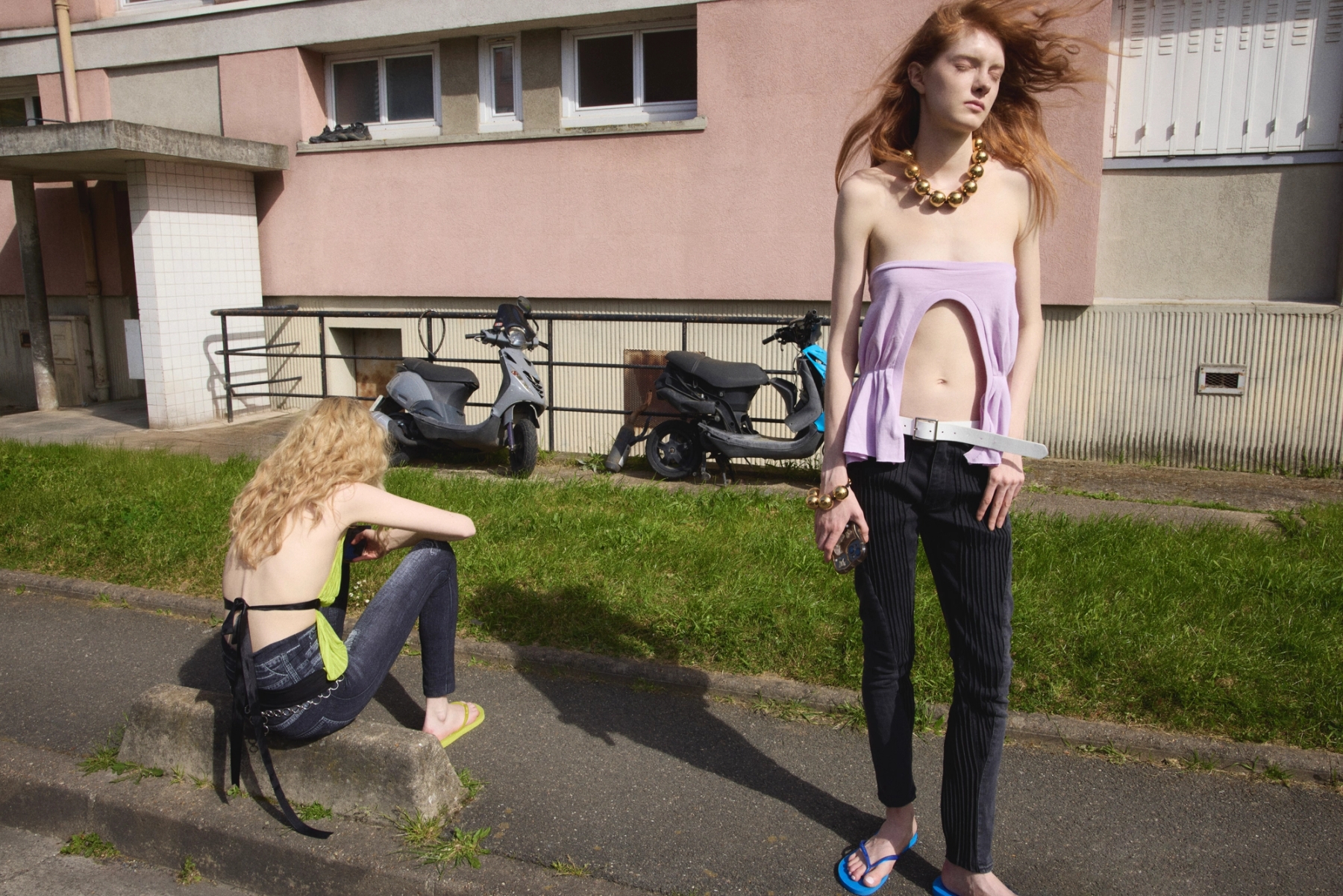 Left to right: Lena in Top & Belt Lariulà, Legging Trashy Clothing, Shoes Havaianas, Earrings Panconesi | Elizabeth in Top, Trousers & Belt Sia Arnika, Shoes Havaianas, Necklace & Bracelet D’Heygere