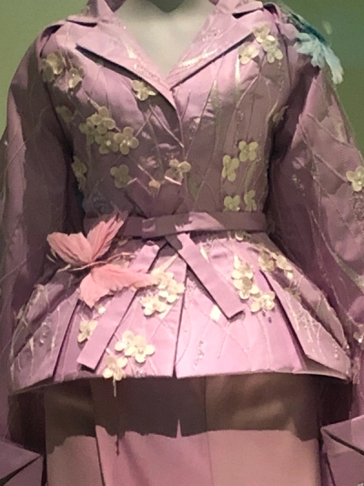 Left: Dress and oni sash, far right: a 'La-La-San' ensemble, both by John Galliano 