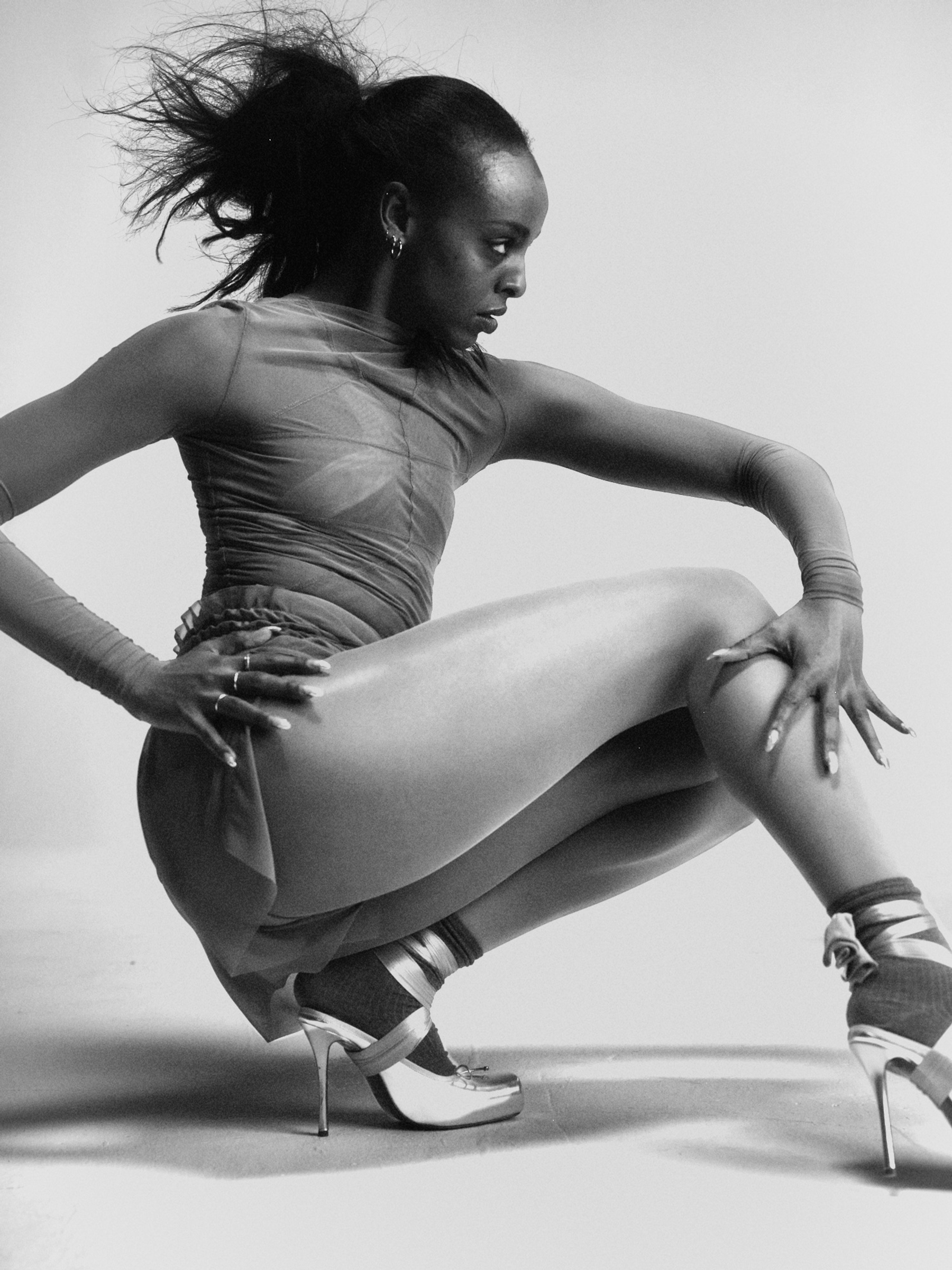 Kamilla in whole look Rick Owens, Tights, Socks, Tights used as ribbons stylist’s own, Shoes Christian Louboutin, all Jewellery model’s own