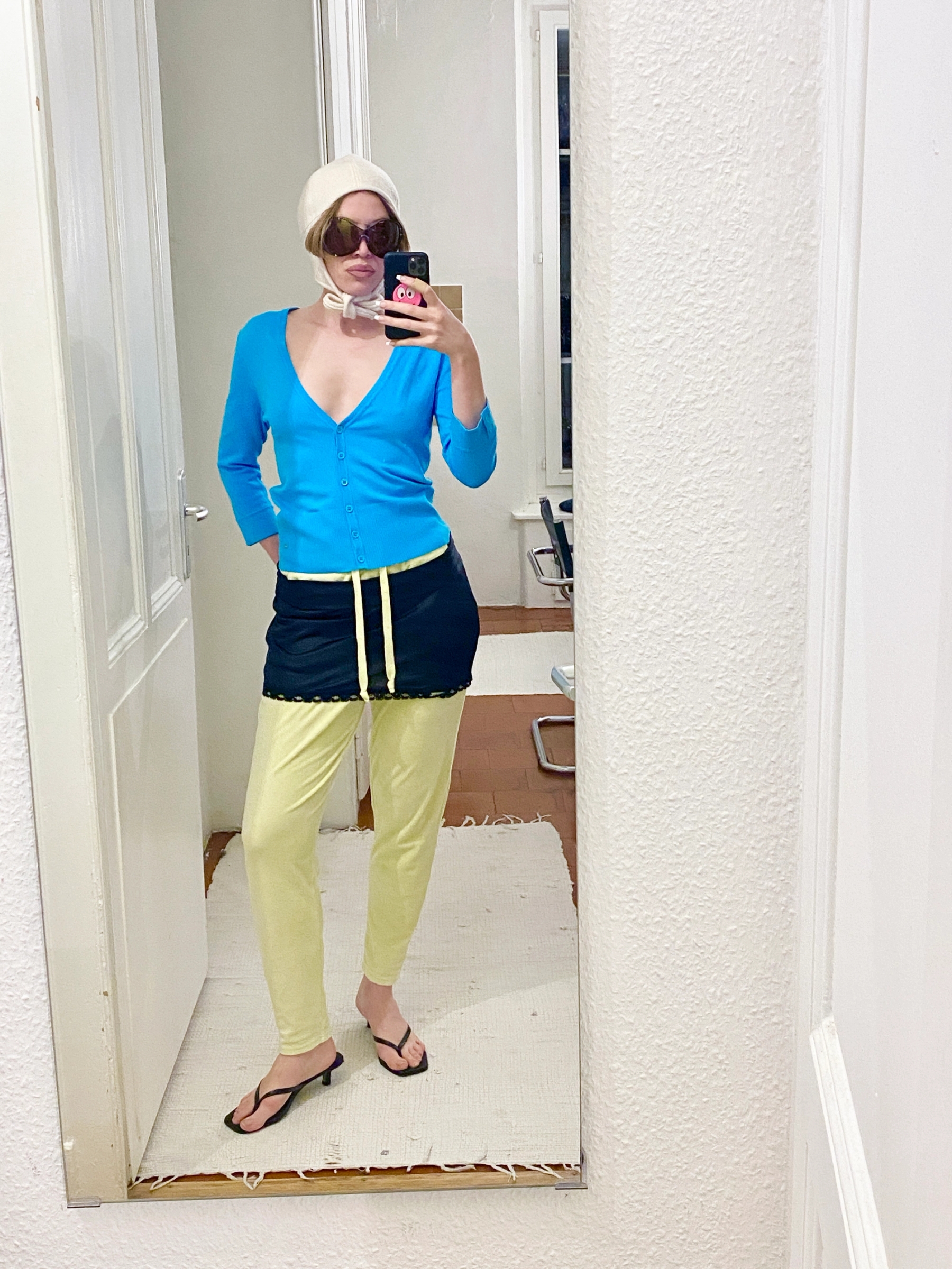 Top Street One, Skirt & Trousers no brand, Shoes Signature, Hat Jean-Robert Gase, Sunglasses Dior
