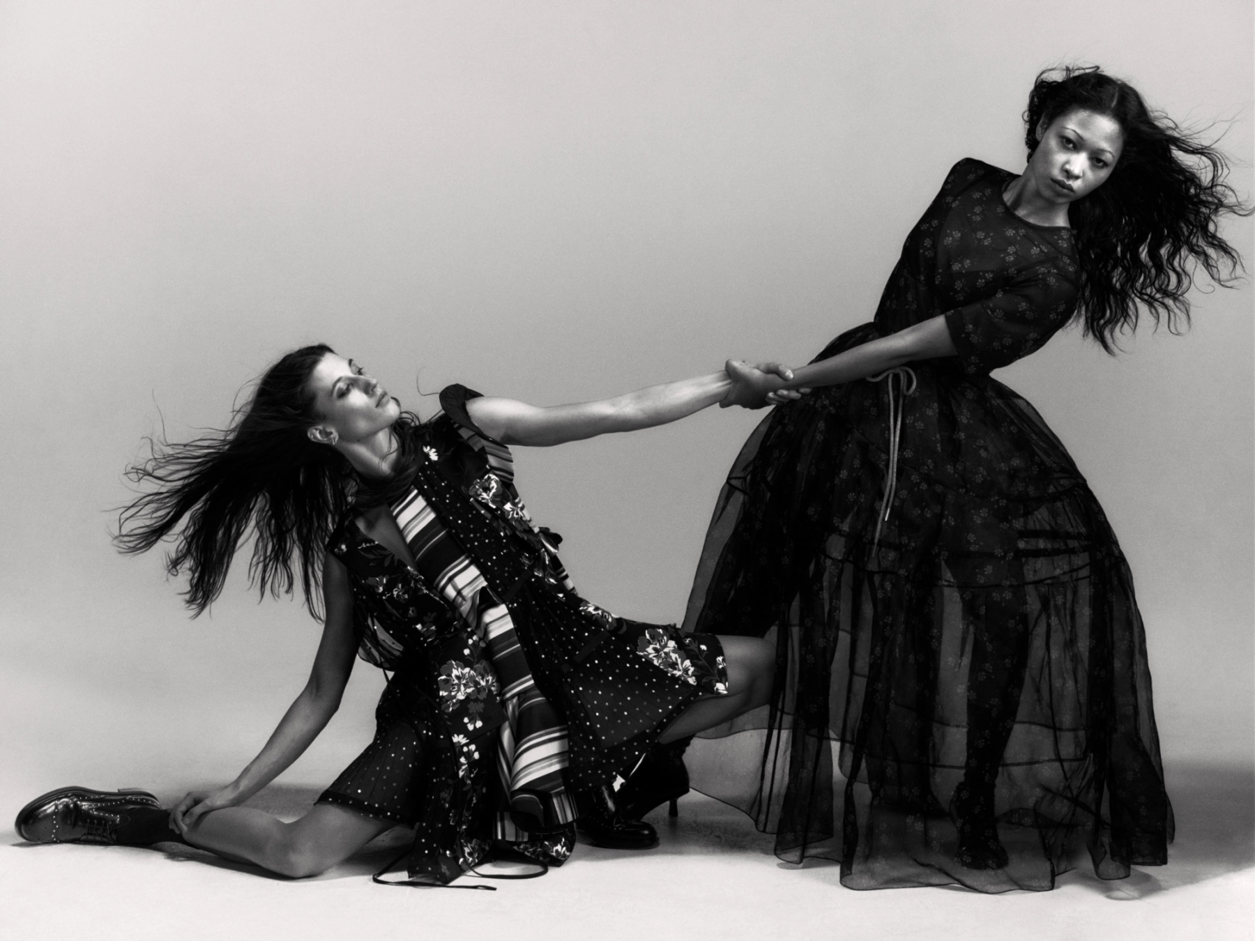 Left to right: Lea in Dress Sacai, Socks stylist’s own, Shoes Vagabond, all Jewellery model’s own | Zahra in Top Simone Rocha, Skirt Simone Rocha, Bra and Socks stylist’s own, Shoes Charles and Keith, all Jewellery model’s own