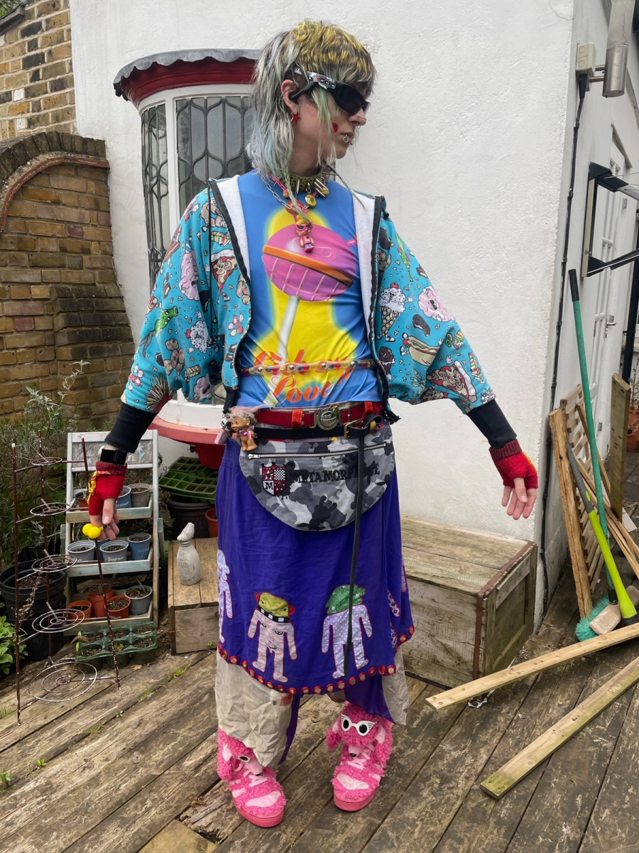 1. Hat: Couch UK - Top: Bernhard Willhelm - Bag: Wild & Lethal Trash - Pants: Altered Mind - Shoes: Suicoke x Vibram x Midorikawa Five Fingers - Orb: Vivienne Westwood x Swatch / 2. Sunglasses: Jameriquai x Oakley Thump - Choker: @alexjustspat - Gloves: Vivienne Westwood - Hoodie: Jeremy Scott - Shirt: Wild & Lethal Trash - Belts: Michiko Koshino, Wild & Lethal Trash, Charles Jefferey Loverboy - Bag: Metamorphose Temps des Fille - Shorts: Waler van Beirendonck - Pants: Takuya Angel - Shoes: Jeremy Scott