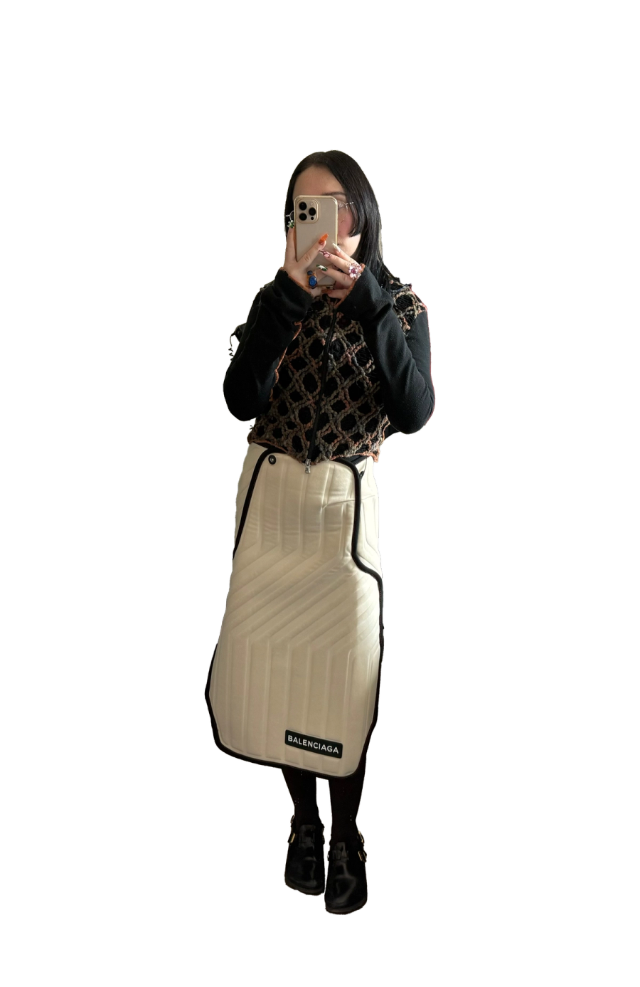 Left to right: Top Misbhv, Skirt Ganni, Shoes Nike | Top Thrift shop, Skirt Balenciaga

