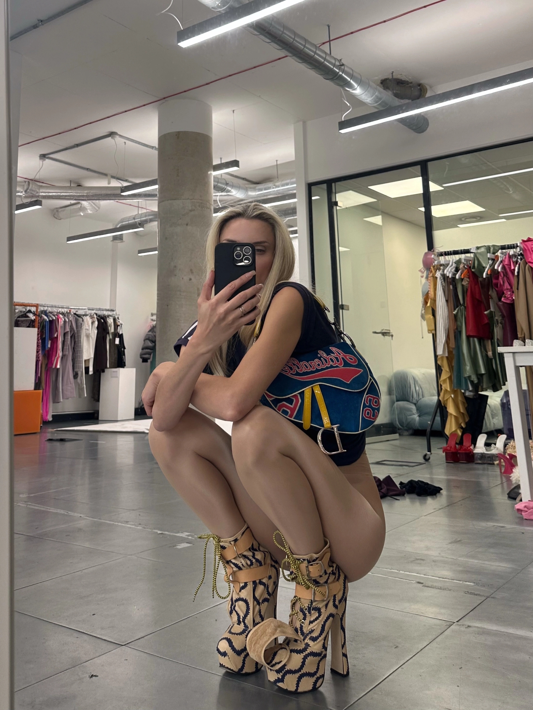 Bag Dior, Top Lonsdale, Tights Wolford, Boots Vivienne Westwood