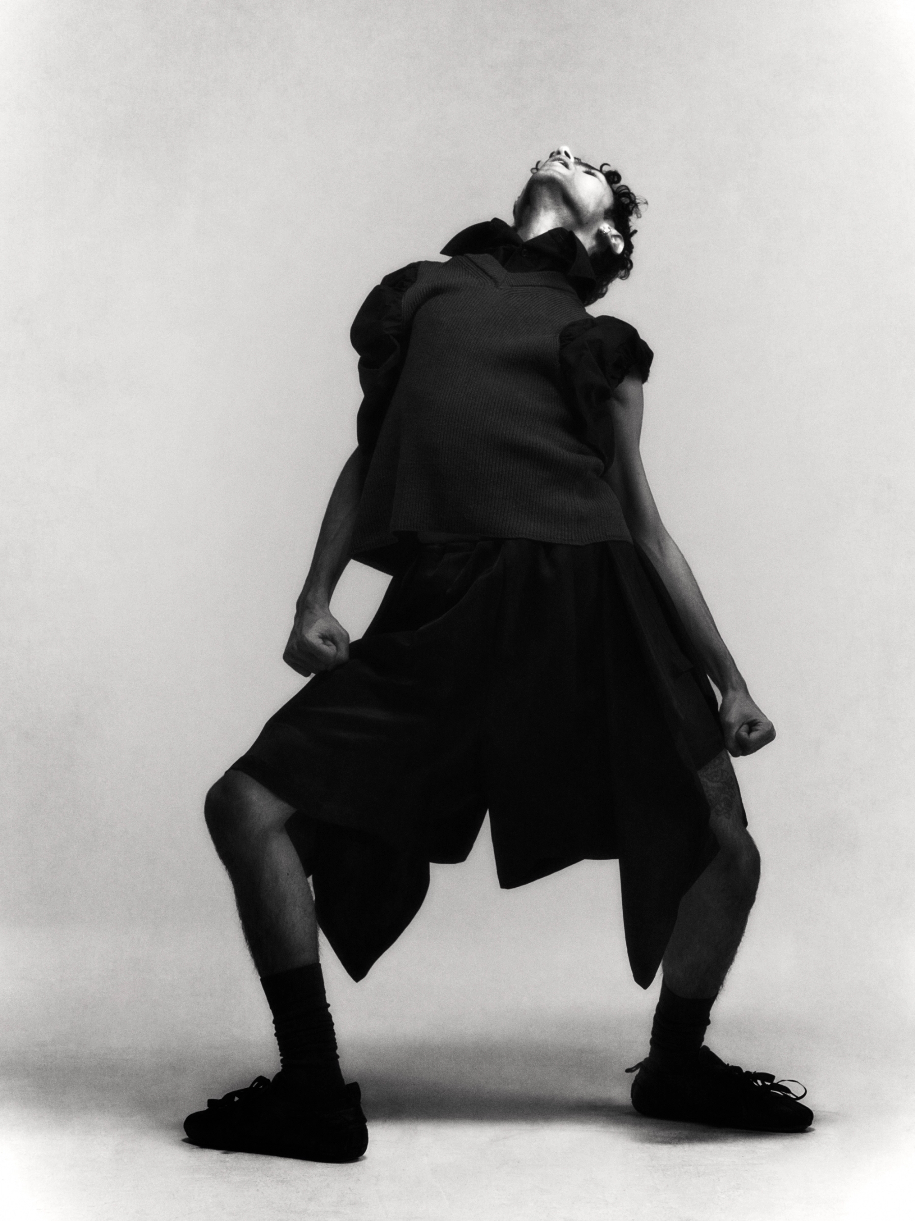 Gian in Top & Shorts Toga, Socks stylist’s own, Shoes Simone Rocha, all Jewellery model’s own