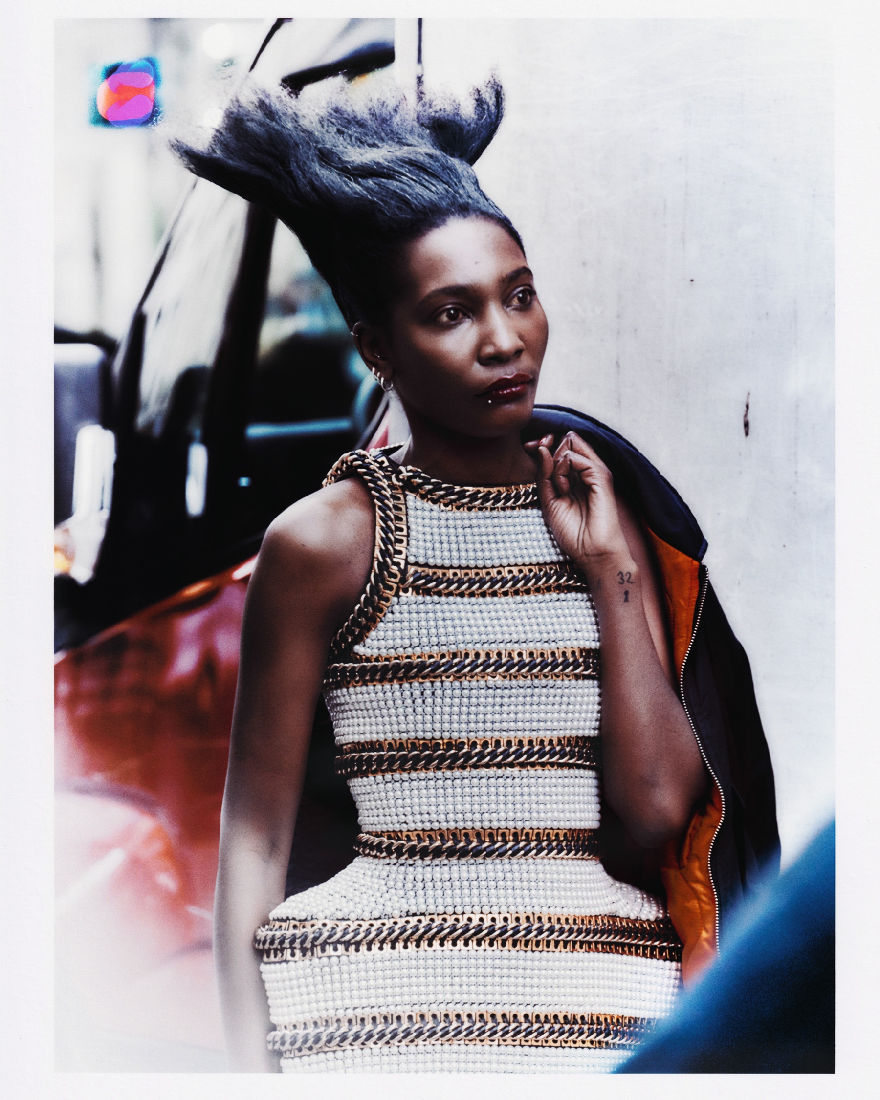 Dress Balmain, Jacket & Earrings talent’s own 
