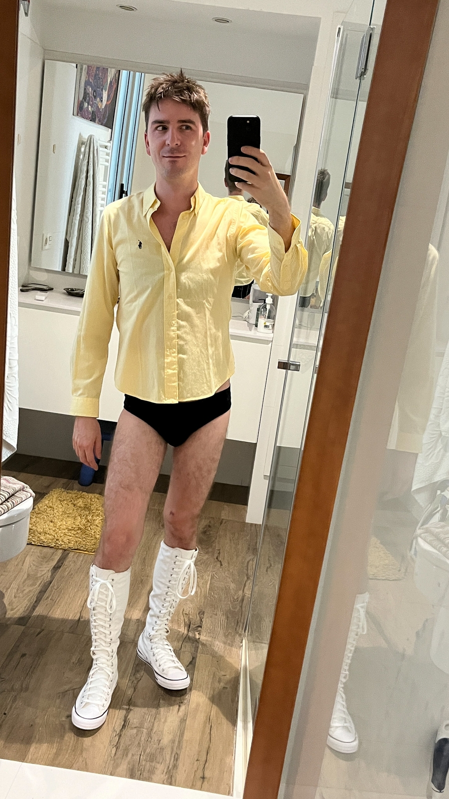 Left to right: All Vintage, Shoes Dries Van Noten | Top Vintage Polo Ralph Lauren, Trainers Converse Chuck Taylor All Star XXHI