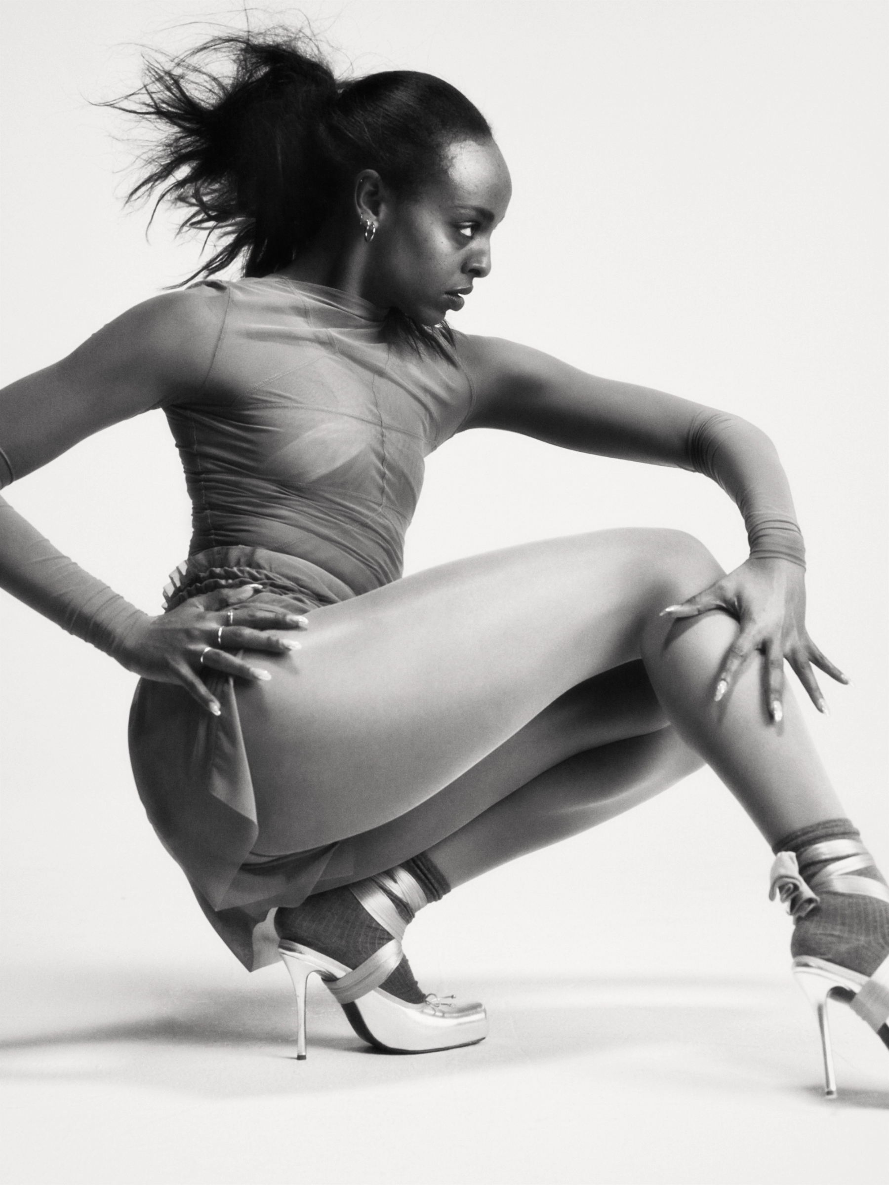 Kamilla in whole look Rick Owens, Tights, Socks, Tights used as ribbons stylist’s own, Shoes Christian Louboutin, all Jewellery model’s own