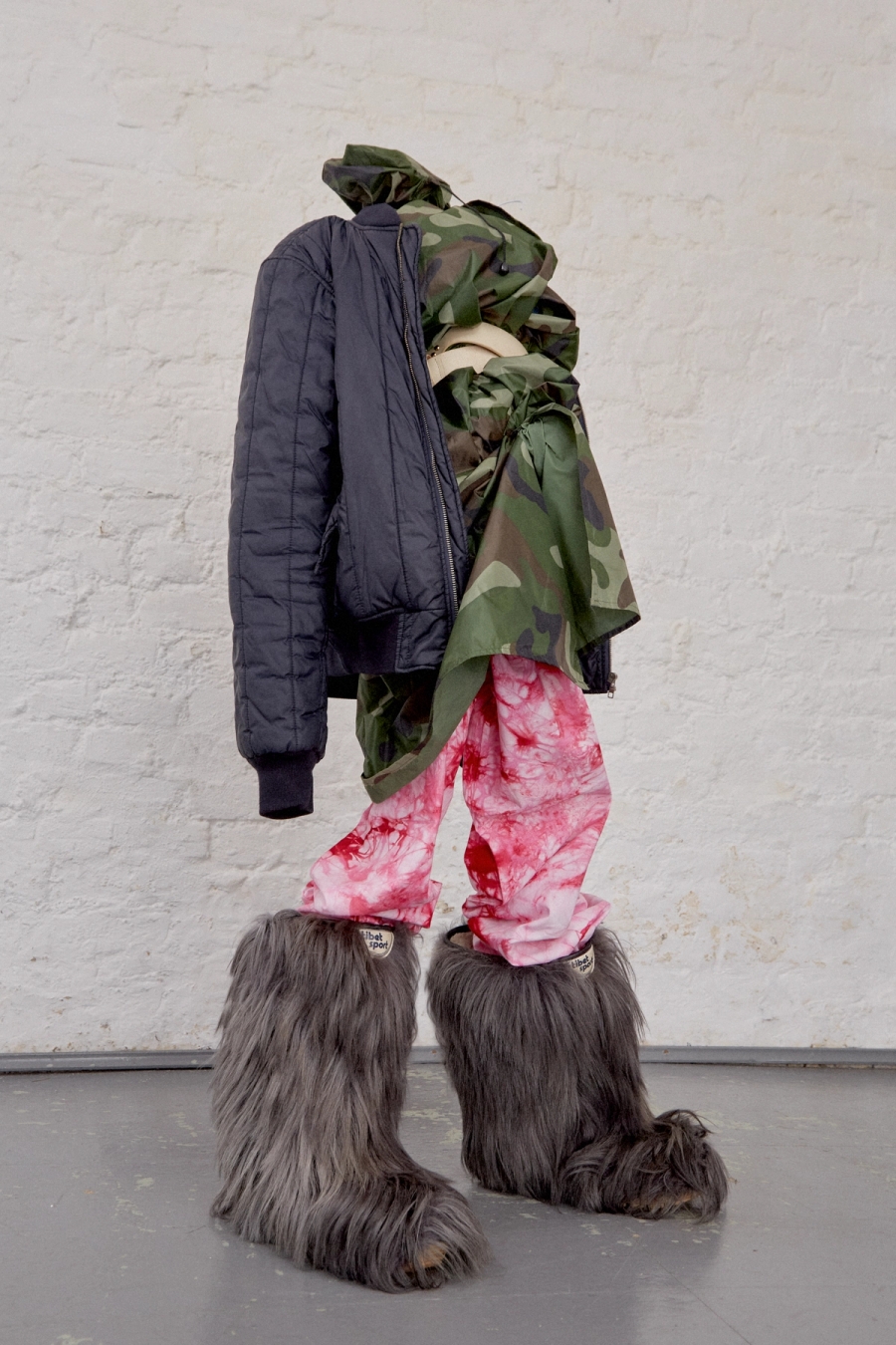 Left to Right: T-shirt Vintage, Trousers (worn underneath) by Junya Watanabe, Skirt by Marni, Heels by Prada / T-shirts, shirt and belt Vintage
Trousers (worn underneath) by Tommy Hilfiger, Dress by Miu Miu, Shoes by Crocs