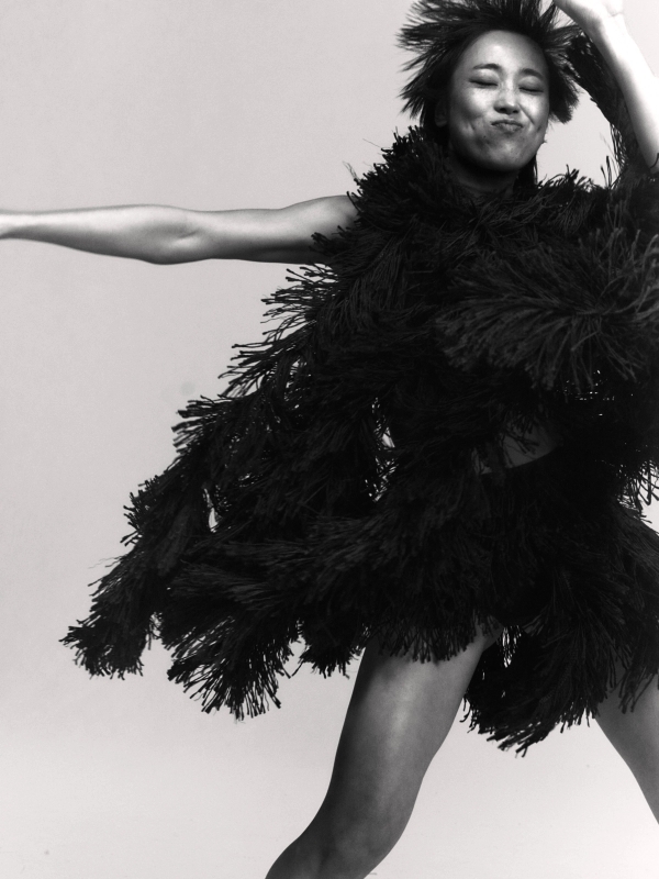 Emiri in Top & Skirt Alaïa, Socks stylist’s own, Shoes Vagabond, all Jewellery model’s own