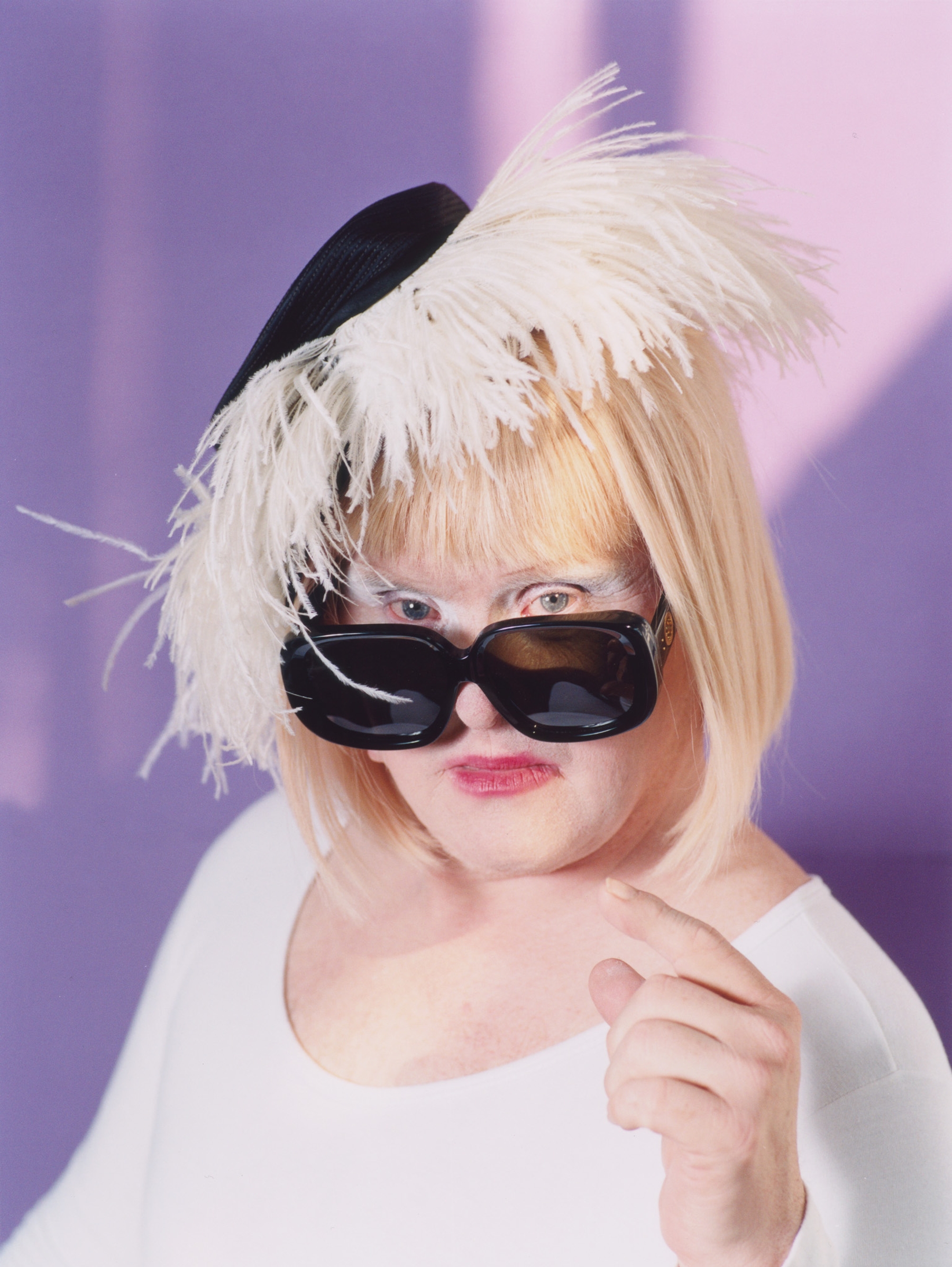 Davina Starr | Bodysuit: Talent’s own, Hat: Contemporary Wardrobe, Sunglasses: Linda Farrow