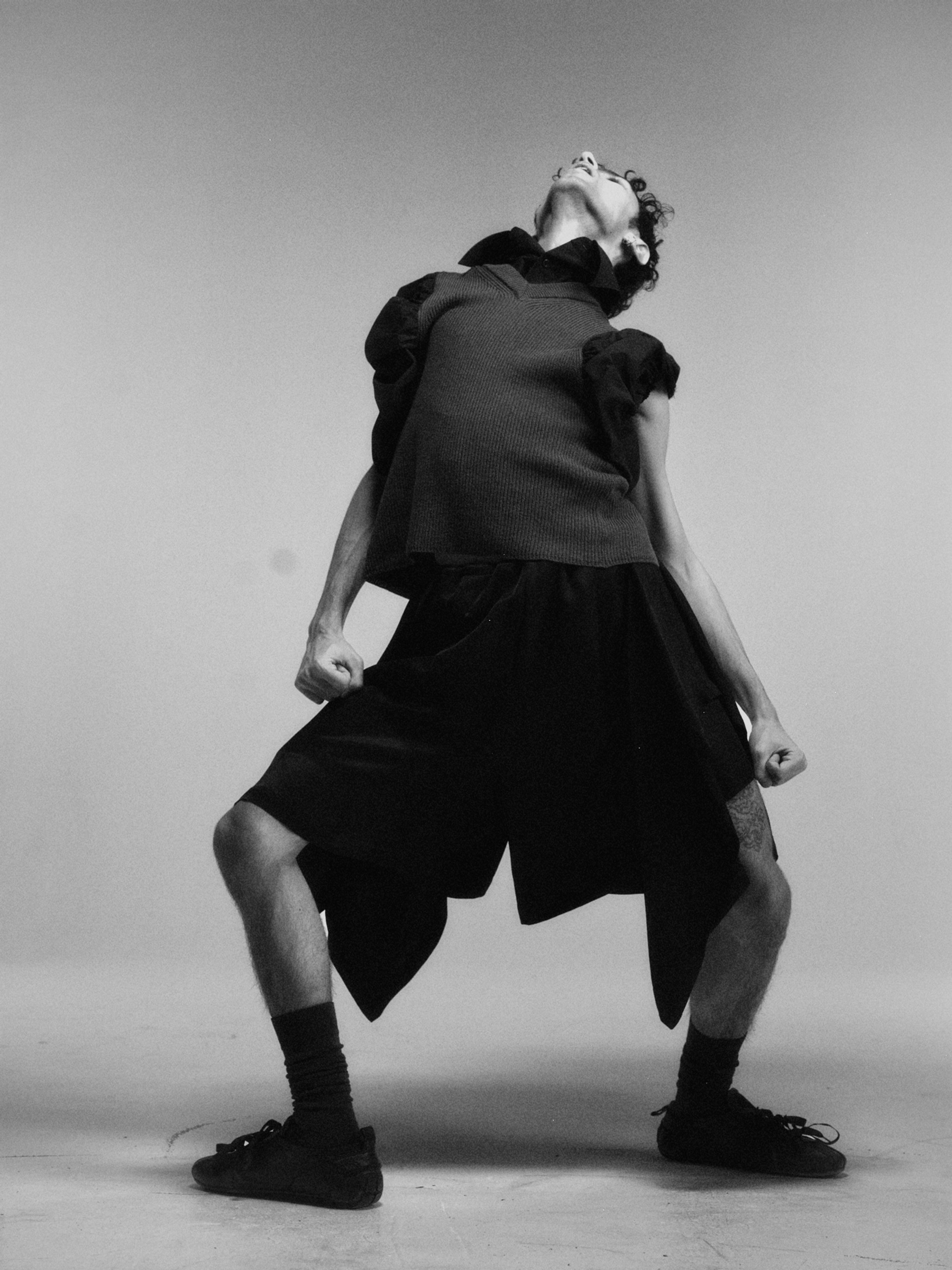 Gian in Top & Shorts Toga, Socks stylist’s own, Shoes Simone Rocha, all Jewellery model’s own