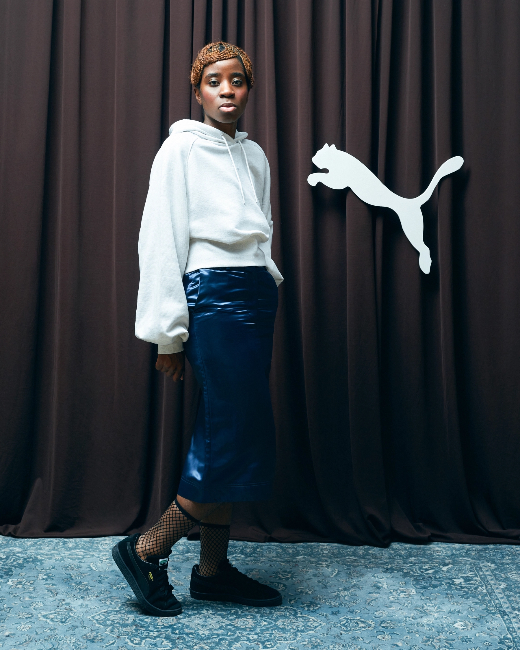 Hoodie & Shoes Puma, Skirt Calvin Klein vintage, Socks stylist’s own