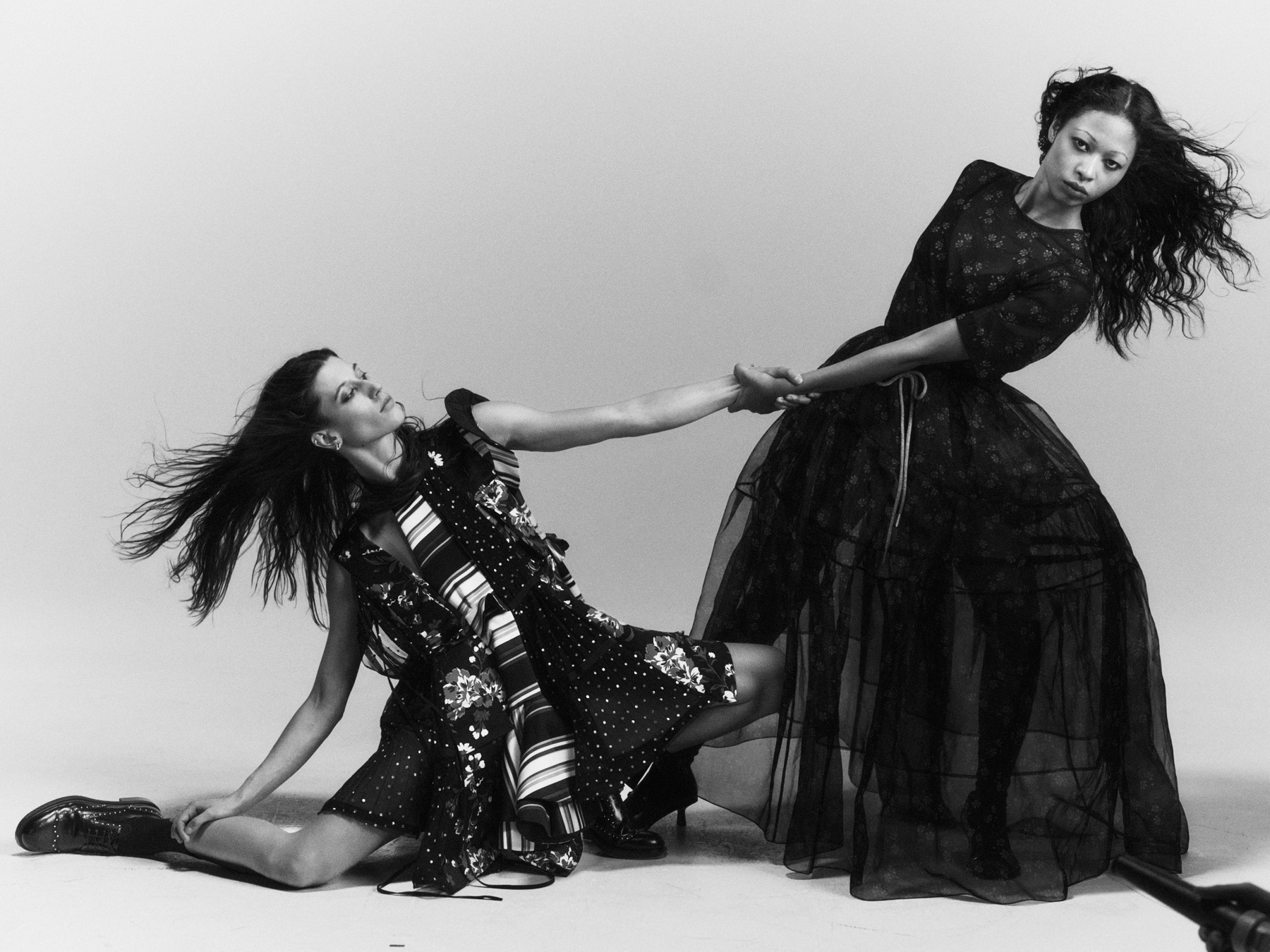 Left to right: Lea in Dress Sacai, Socks stylist’s own, Shoes Vagabond, all Jewellery model’s own | Zahra in Top Simone Rocha, Skirt Simone Rocha, Bra and Socks stylist’s own, Shoes Charles and Keith, all Jewellery model’s own