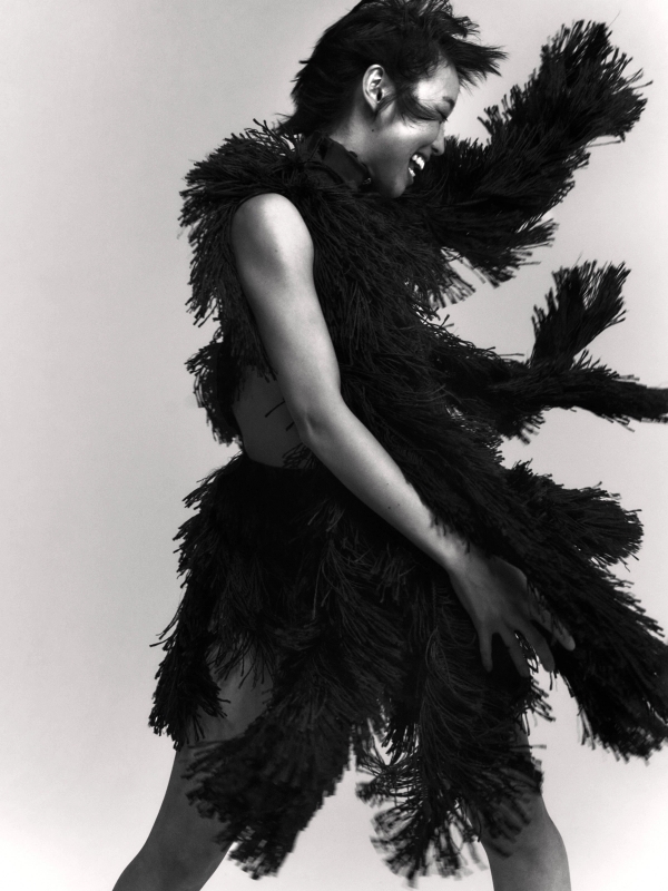 Emiri in Top & Skirt Alaïa, Socks stylist’s own, Shoes Vagabond, all Jewellery model’s own