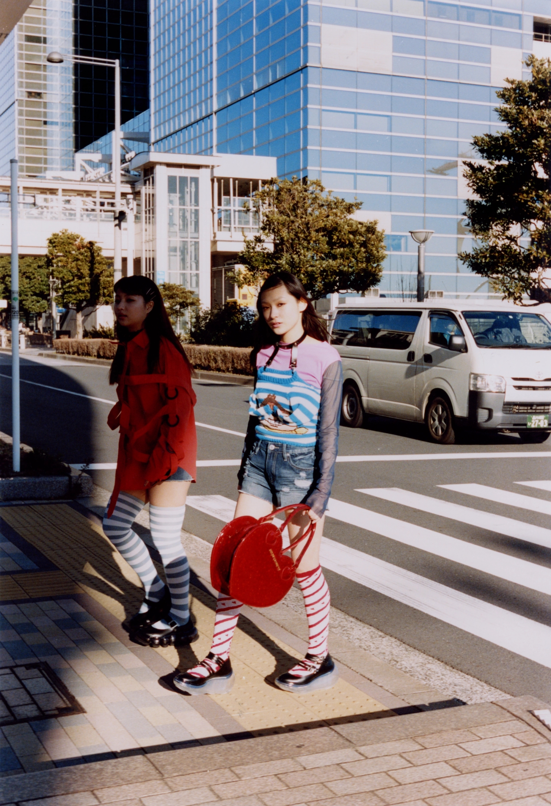 Reian wears shirt Soshiotsuki, black lace chocker Angelicpretty, shoes Mikiosakabe/ Yuri wears t-shirt Ans Dotsloevner, knit top and leather choker Pillings, heart bag and border socks Angelicpretty, shoes JennyFax
