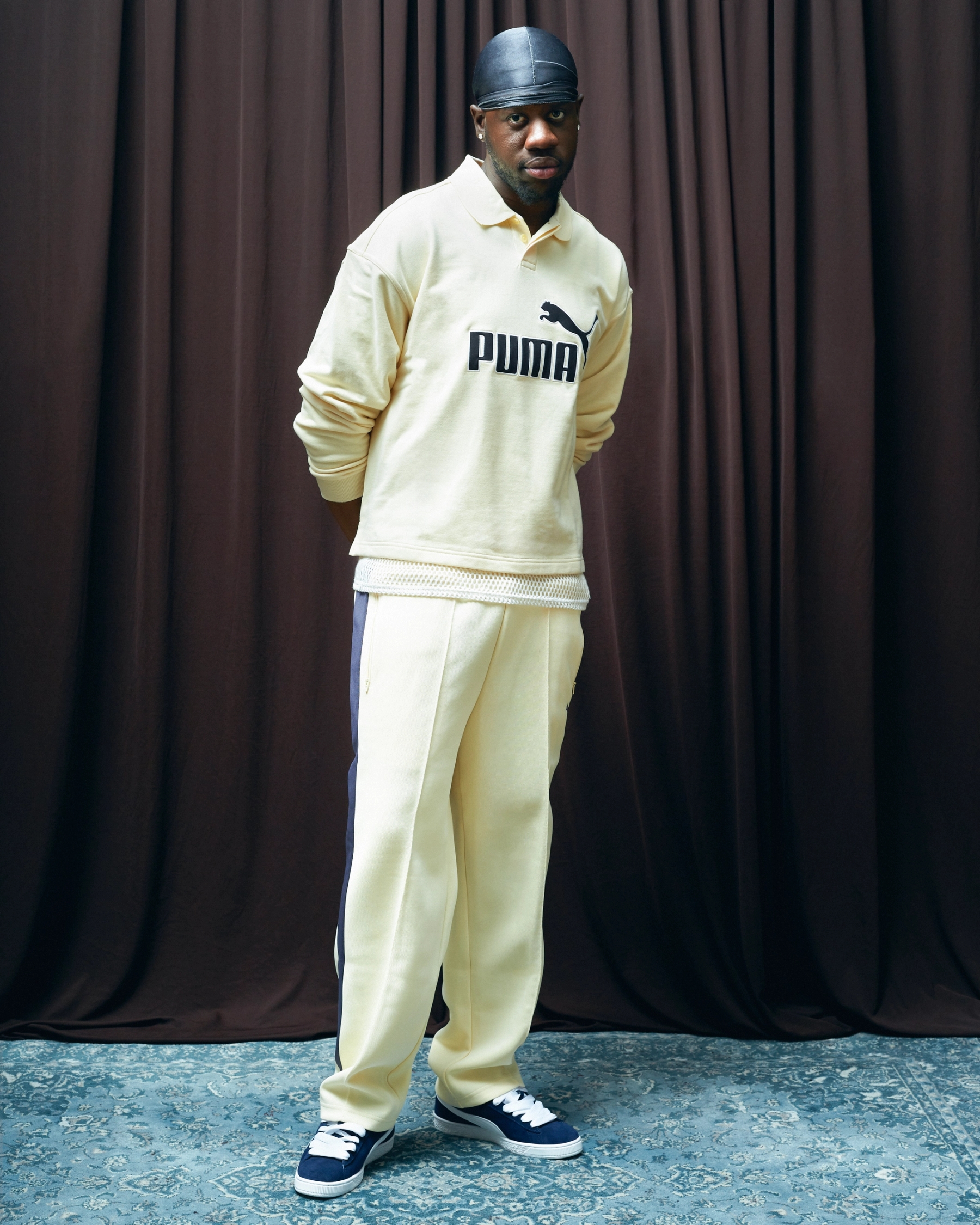 Top, Tracksuit Pants & Shoes Puma, Tank Top stylist’s own, Durag, Jewelry & Watch talent’s own