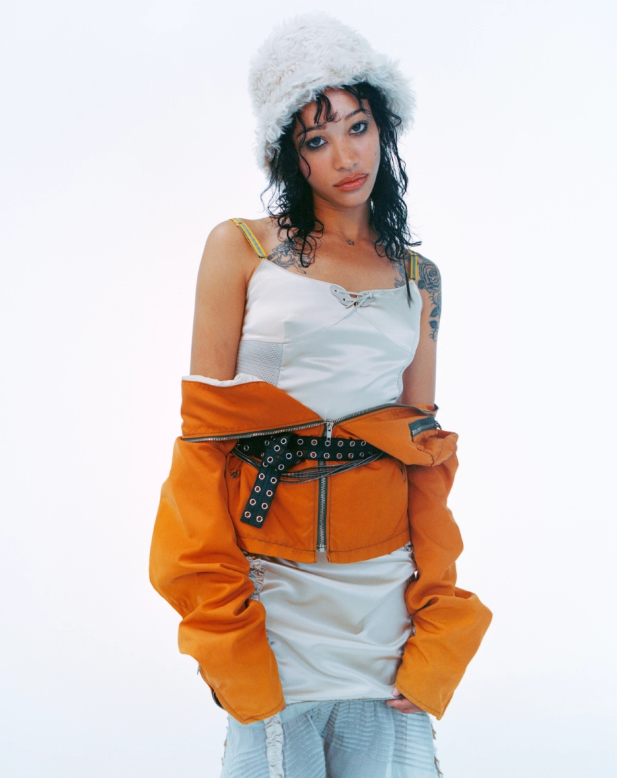 SOCHI: Jacket Helmut Lang, Dress Miu Miu, Hat Prada (Early 2000’s), Belt Helmut Lang (SS 2003), Belt Prada (AW 2009), Boots Maison Martin Margiela (AW 2003) -from Artifact New York fashion archive