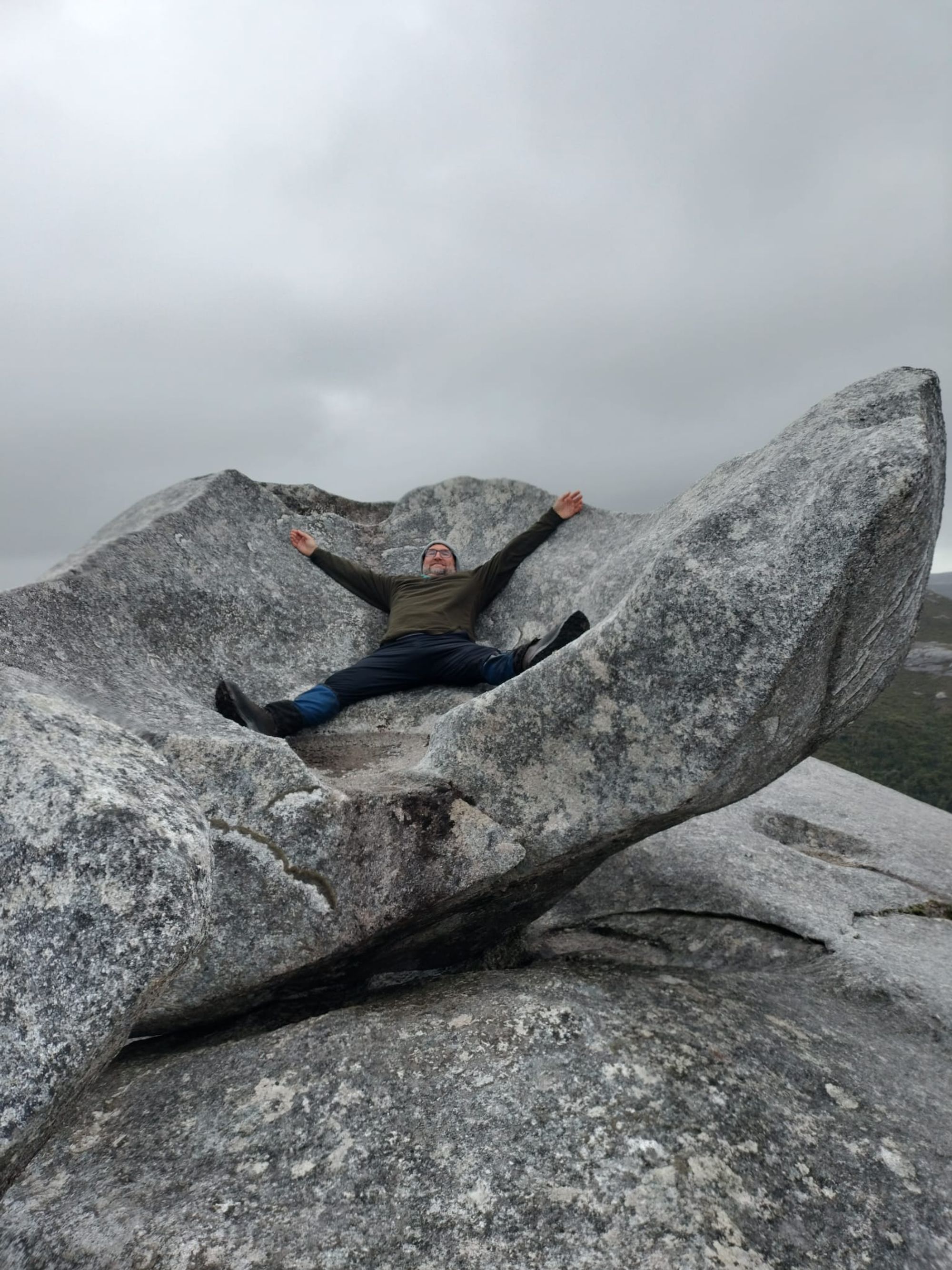 The famous armchair rock formation near the summit of Bald Peak, Stewart Island