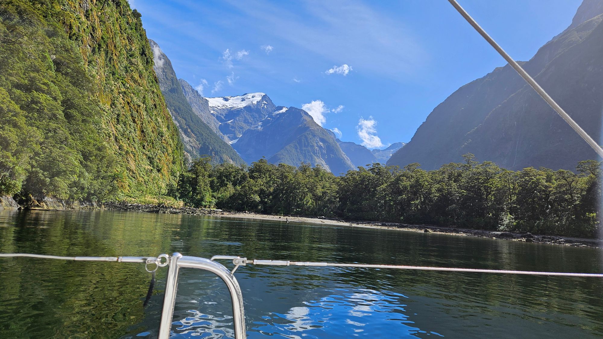 Snow on the alps behind Harrison Cove, sunny afternoon