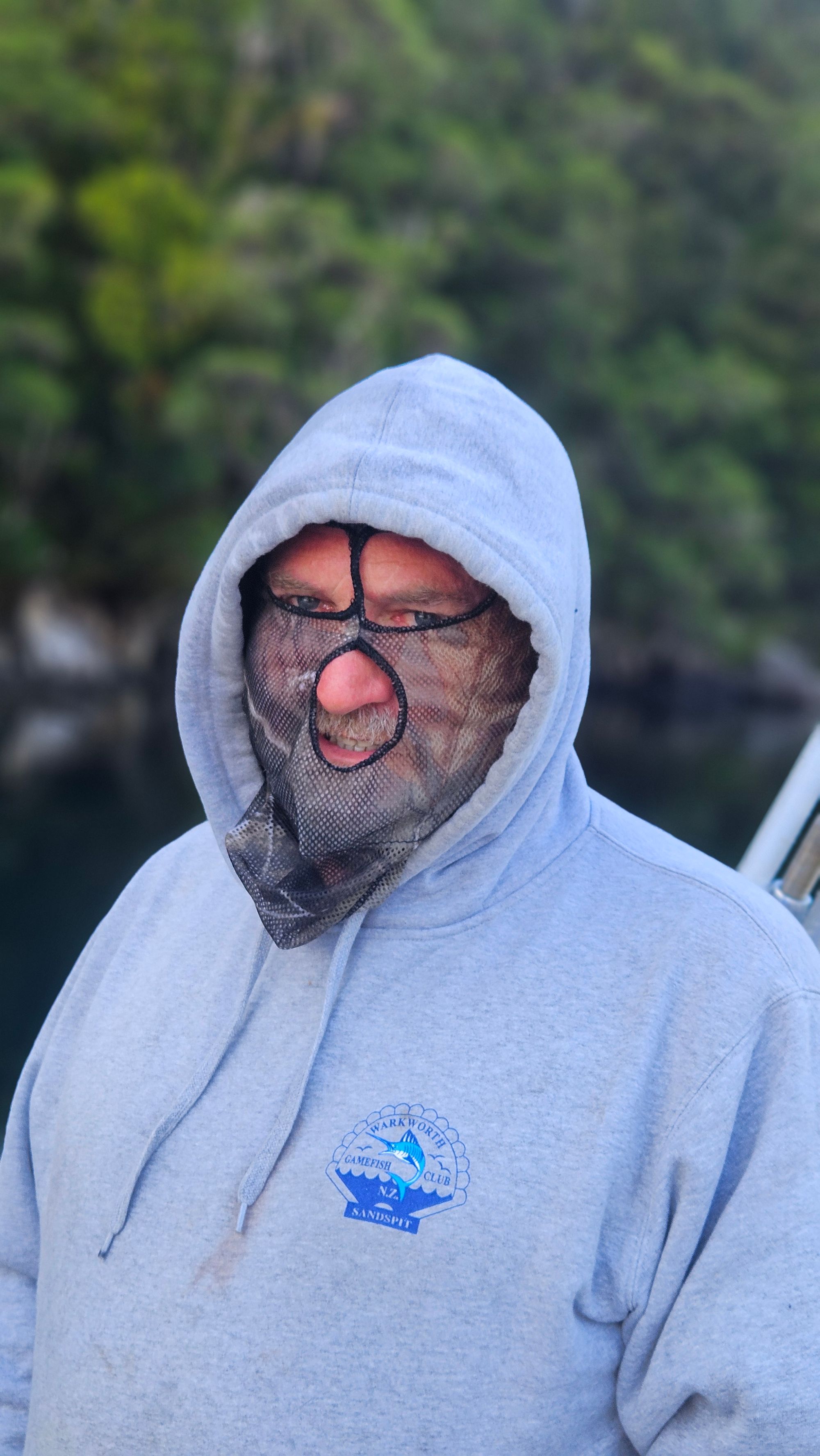 Brendan wearing a bug net in Bligh Sound